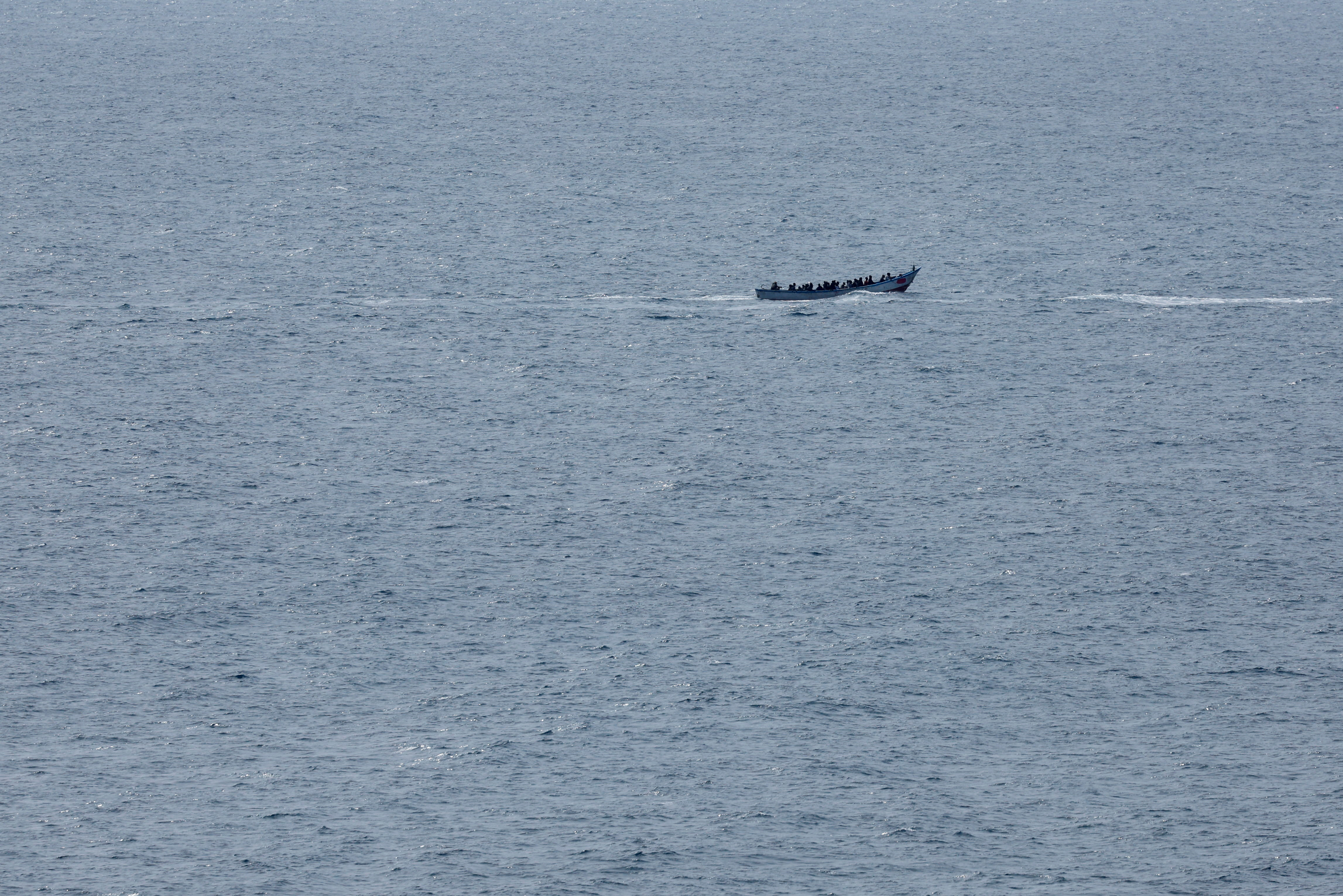 A boat with migrants sails south of the island of Gran Canaria