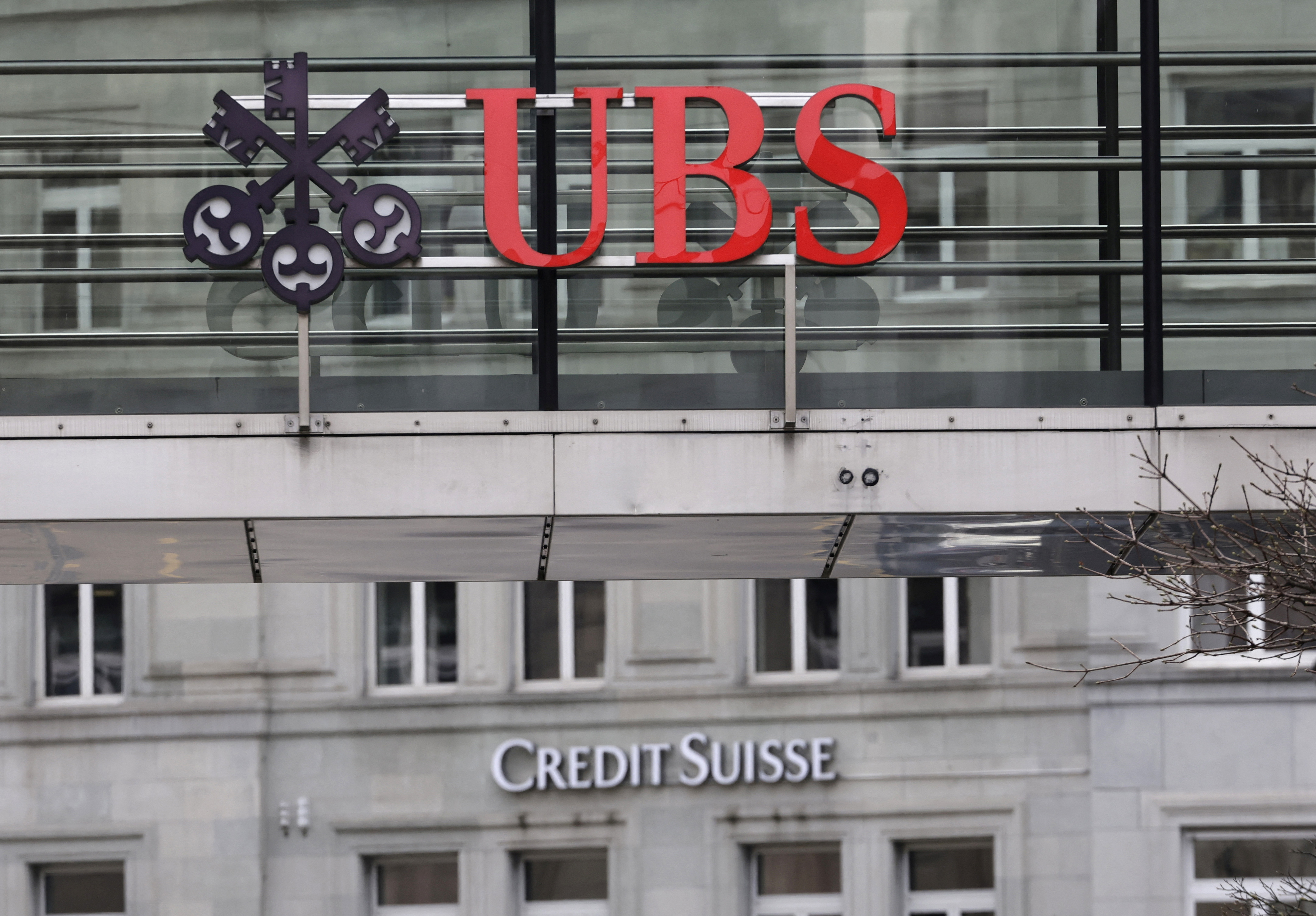 Logos of UBS and Credit Suisse banks are seen in Zurich