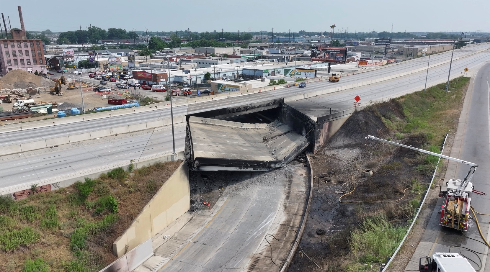 Aftermath of the collapse of I-95 highway after a fuel tanker exploded beneath it, in Philadelphia