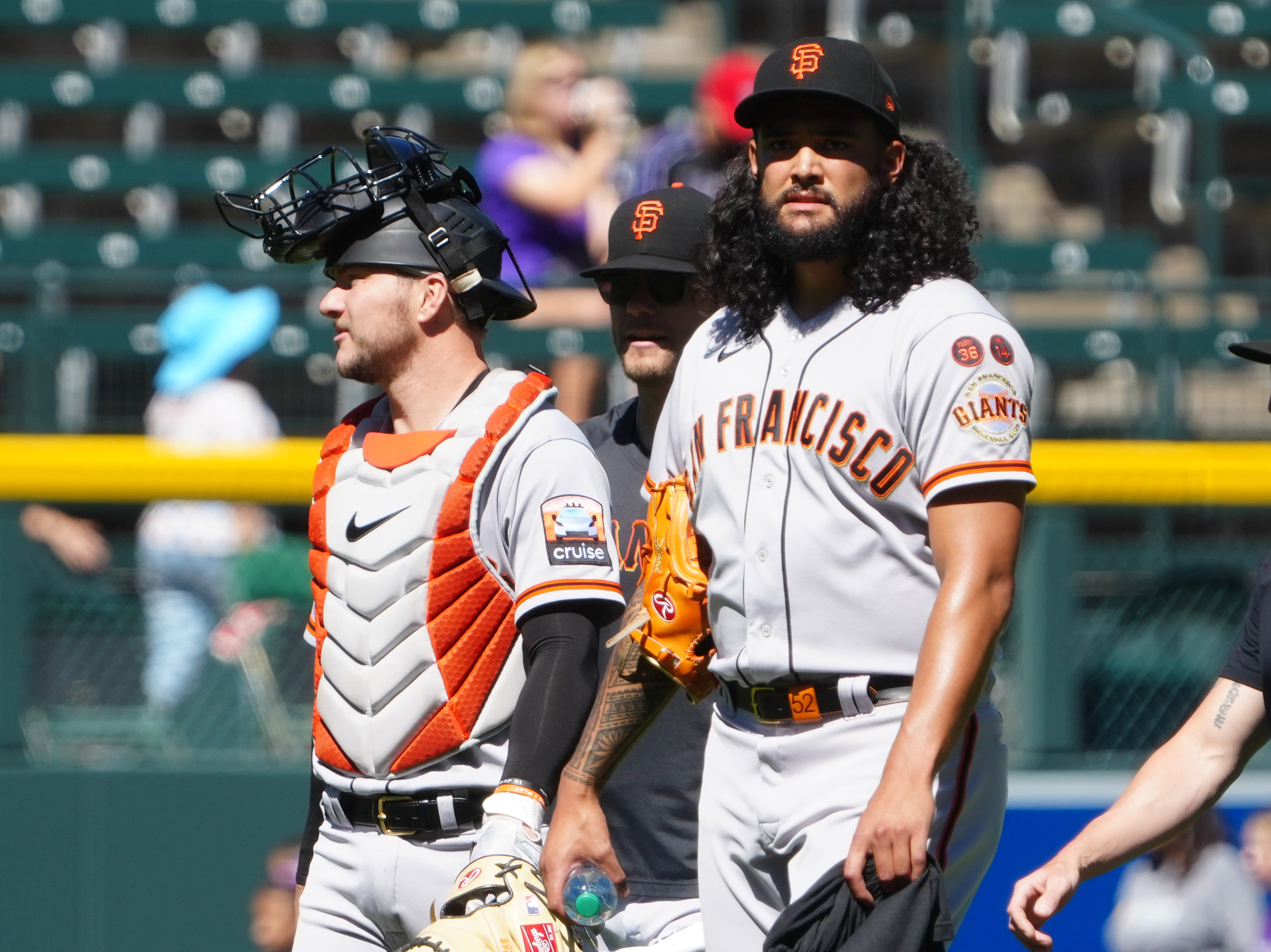 Giants open 9-run lead, hang to to beat Rockies 11-10 and stop