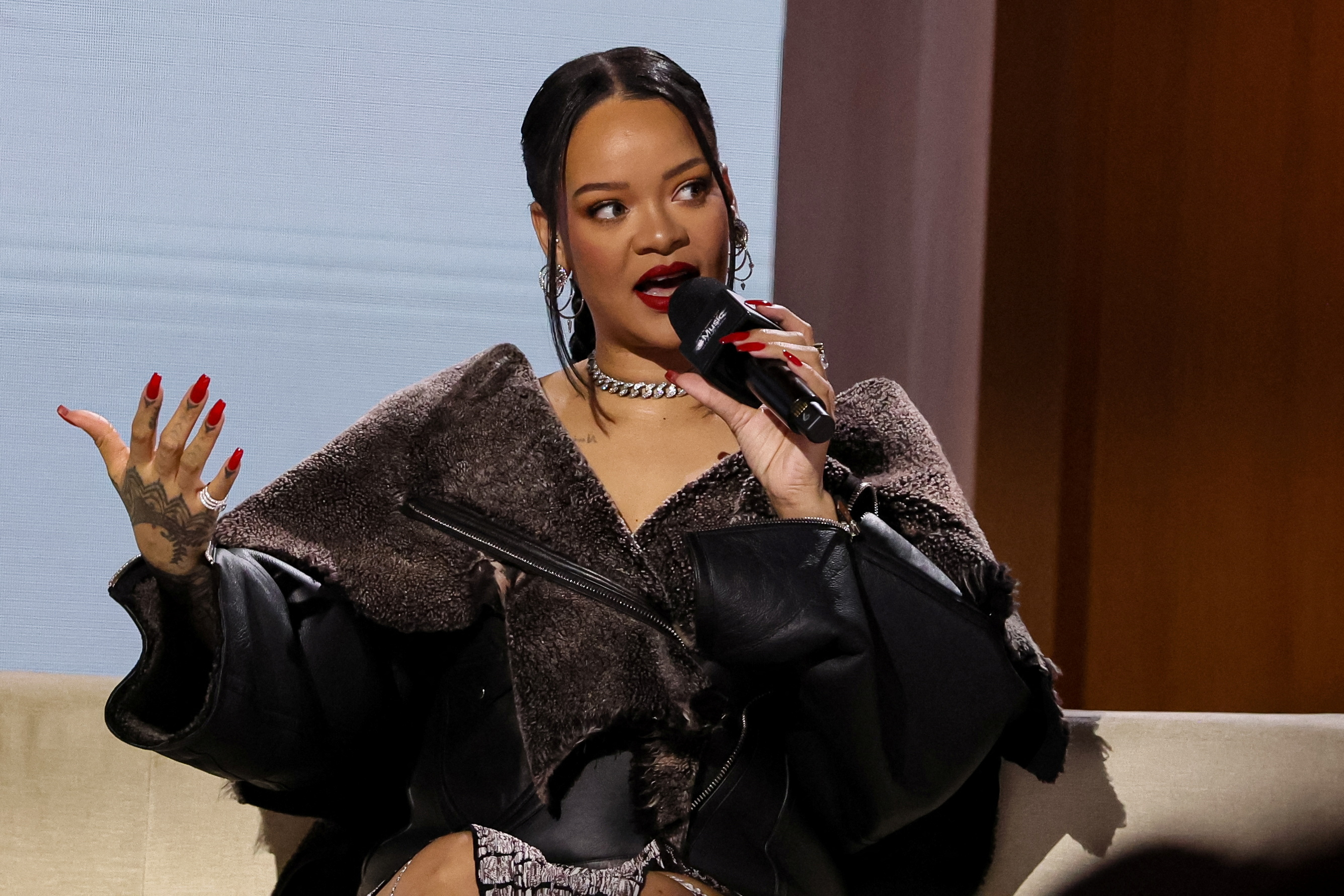 Rihanna returns to the stage in Super Bowl halftime + How Louis