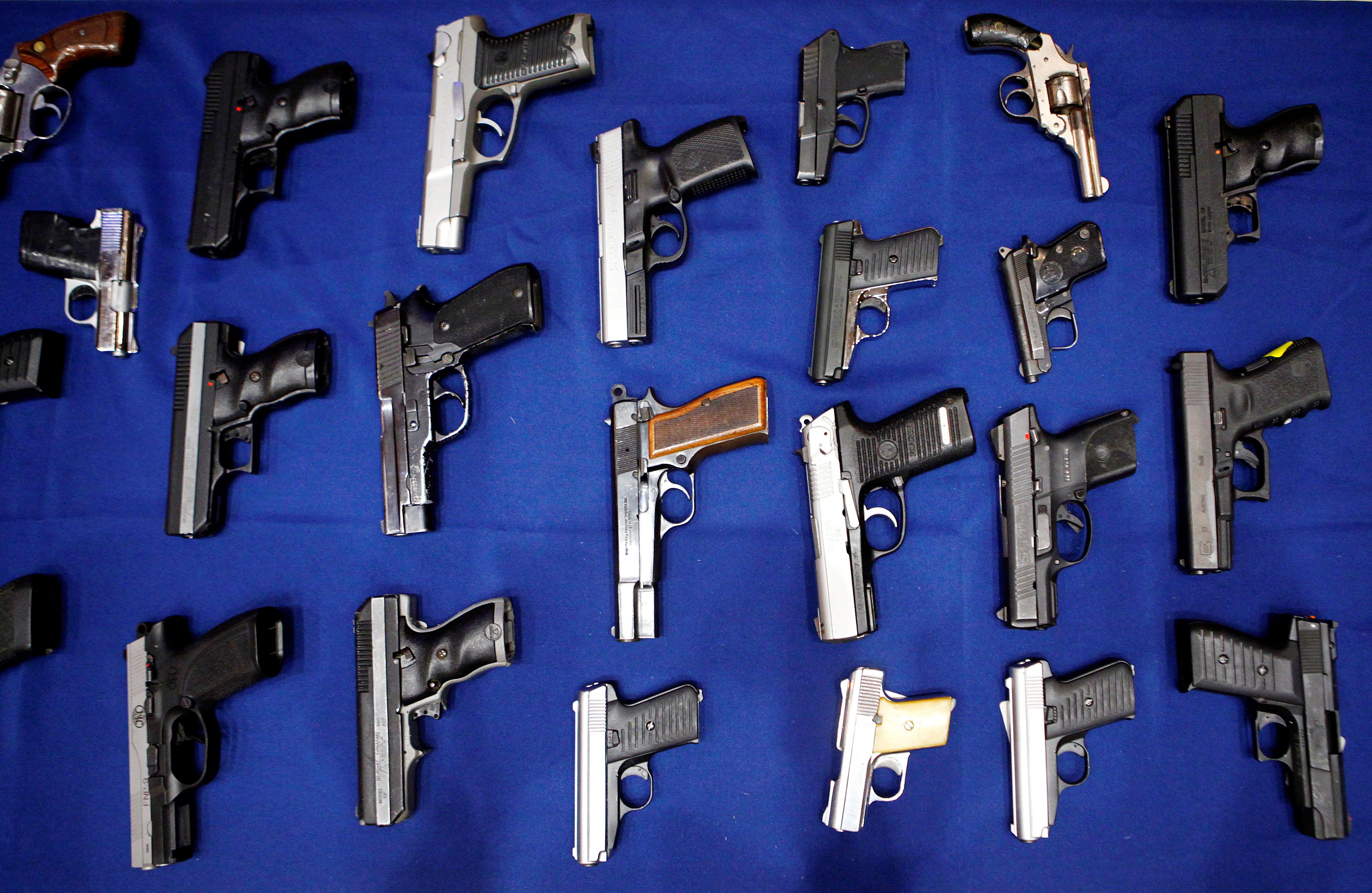 Seized handguns are pictured at the police headquarters in New York City