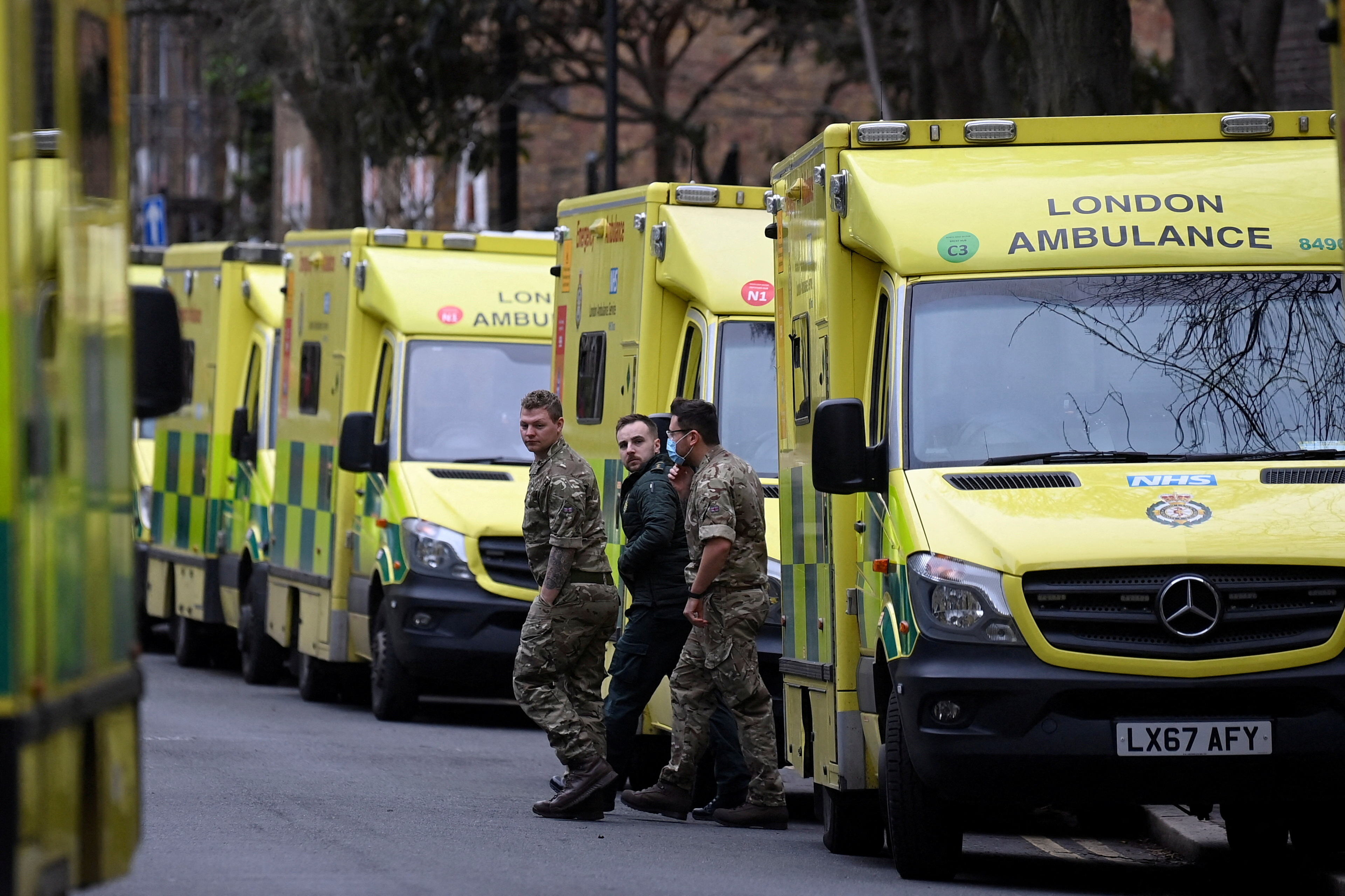 Ambulance workers take part in a strike in London