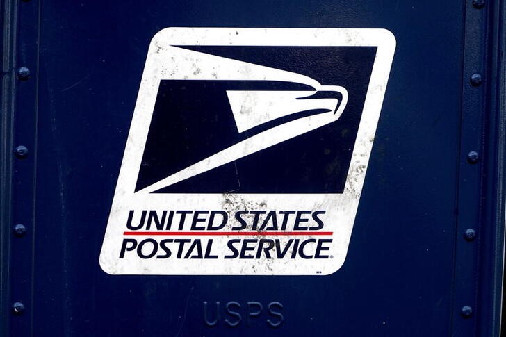 A U.S. Postal Service (USPS) logo is pictured on a mail box in the Manhattan borough of New York City, New York, U.S., August 21, 2020. REUTERS/Carlo Allegri/File Photo