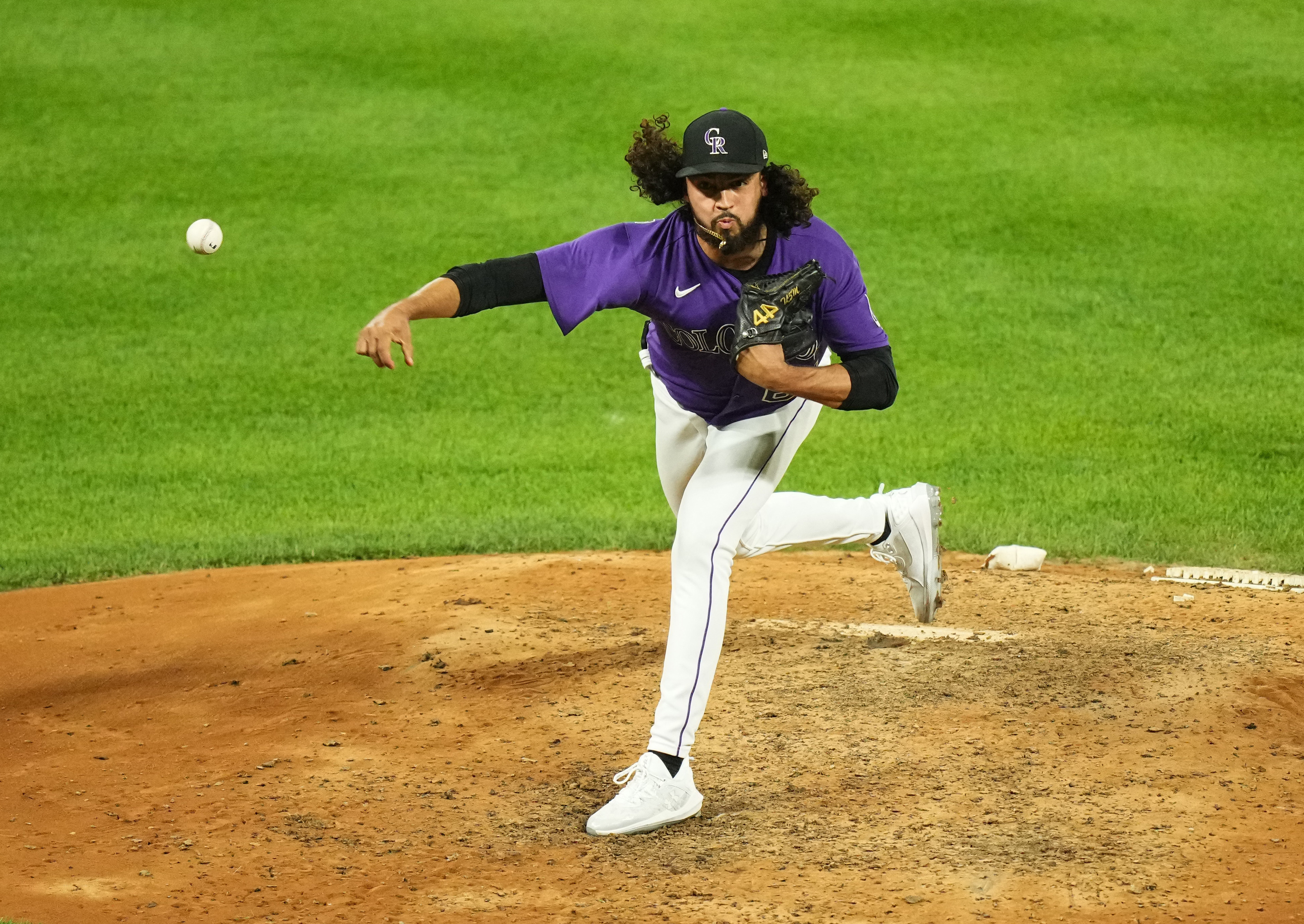 DENVER, CO - JUNE 14: Colorado Rockies right fielder Charlie Blackmon (19)  advances to third base in the tenth inning during a game between the  Cleveland Guardians and the Colorado Rockies at