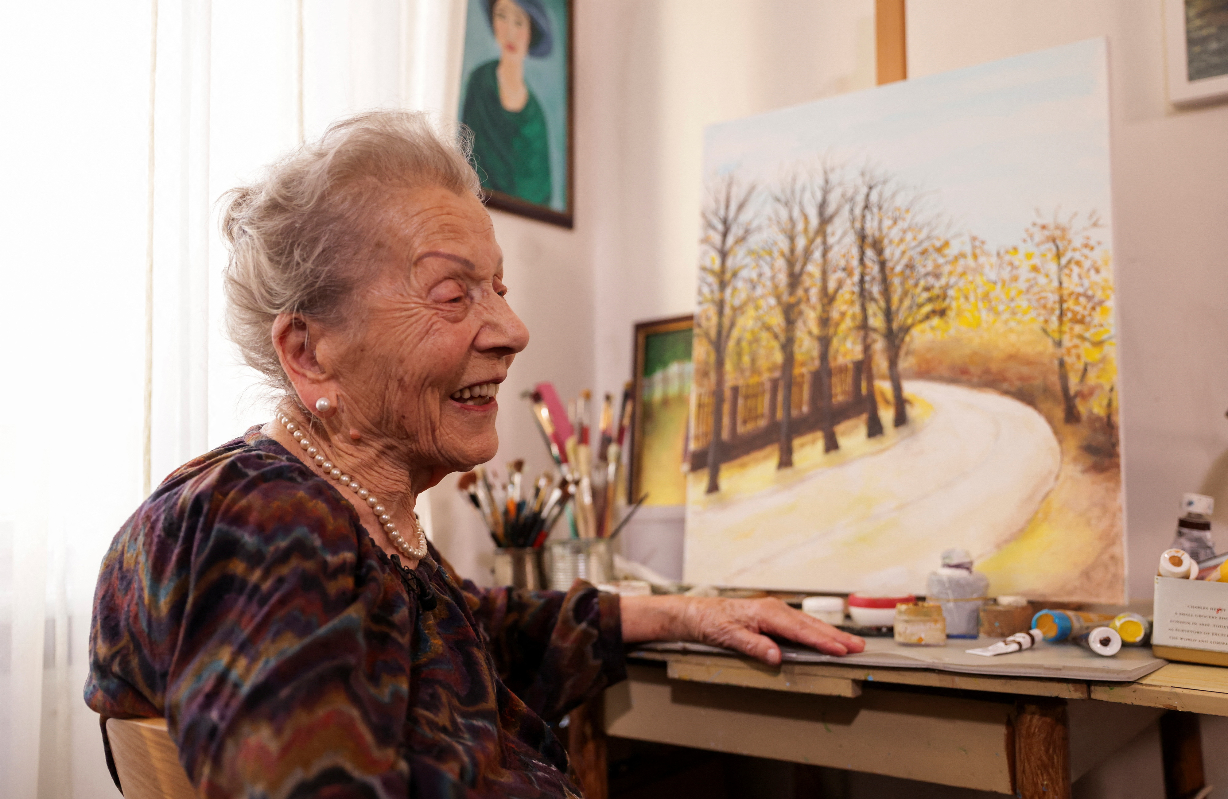 Nada Rudan, a 100-year-old self-taught Bosnian painter, in her home in Sarajevo
