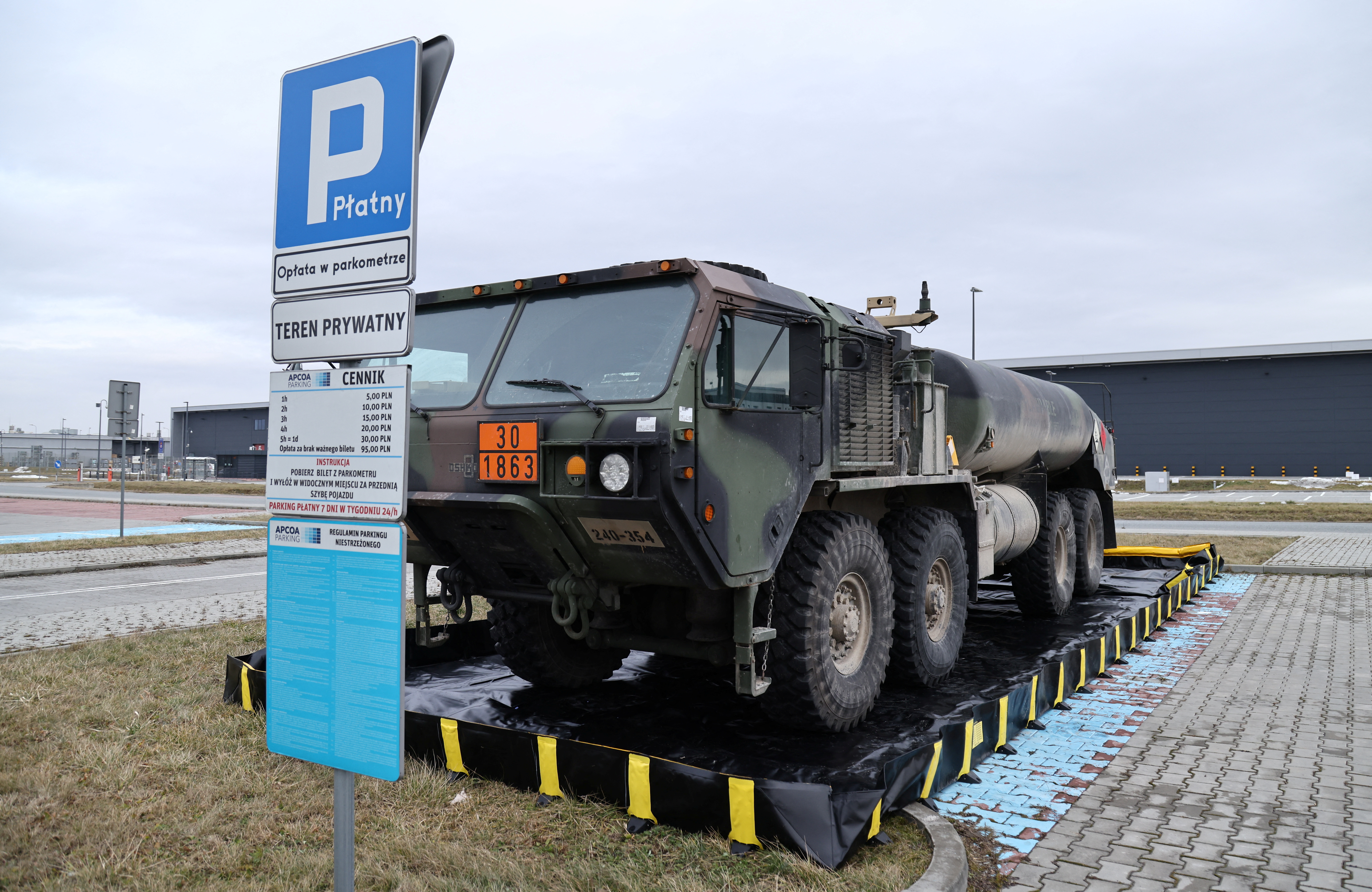 A U.S. Military vehicle is parked outside the G2A Arena near the Rzeszow-Jasionka Airport