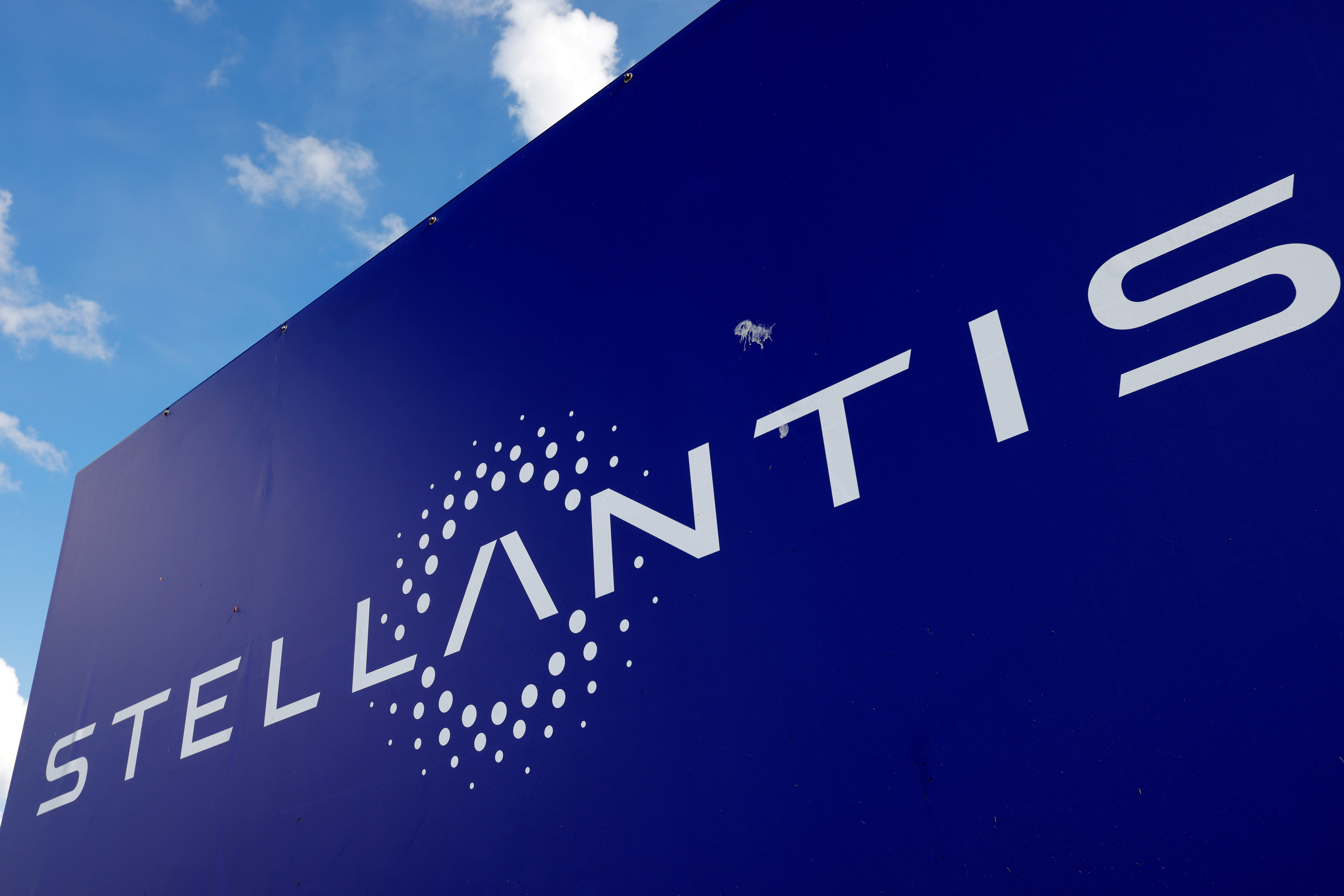 A view shows the logo of Stellantis at the entrance of the company's factory in Hordain, France, July 7, 2021. REUTERS/Pascal Rossignol/File Photo