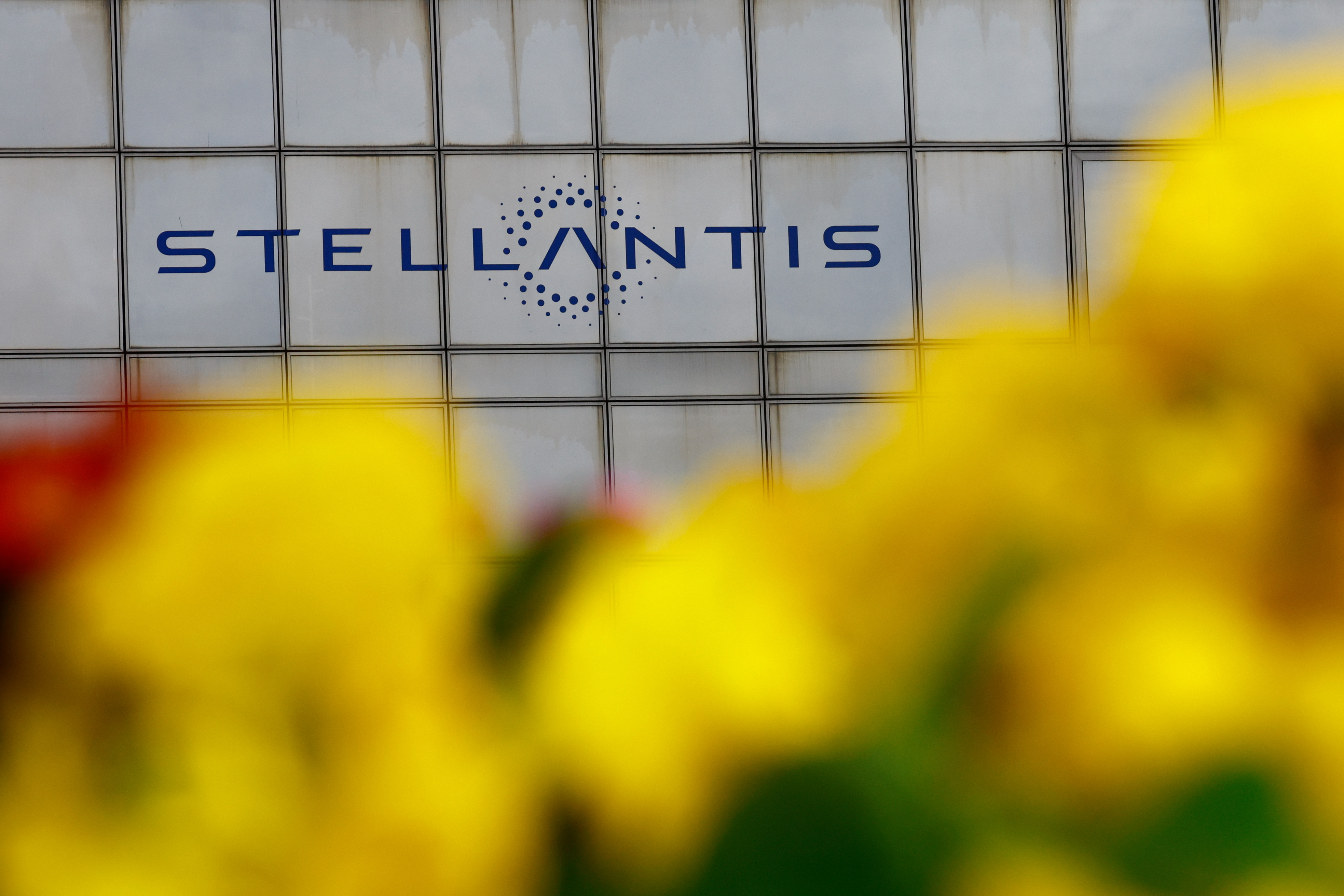 Stellantis logo is seen on the company's headquarters in Poissy near Paris