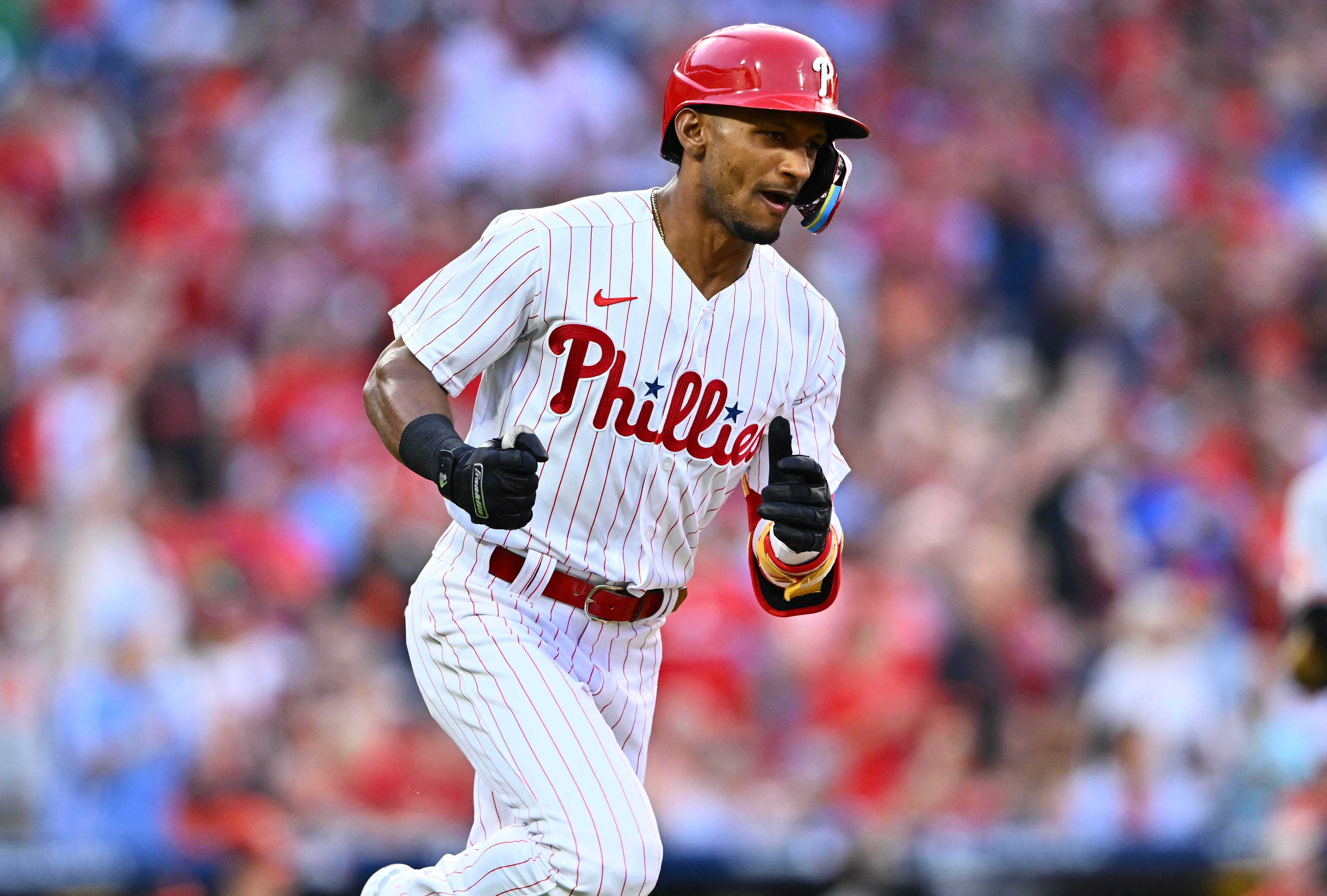 Phillies score twice in ninth for comeback win over Orioles