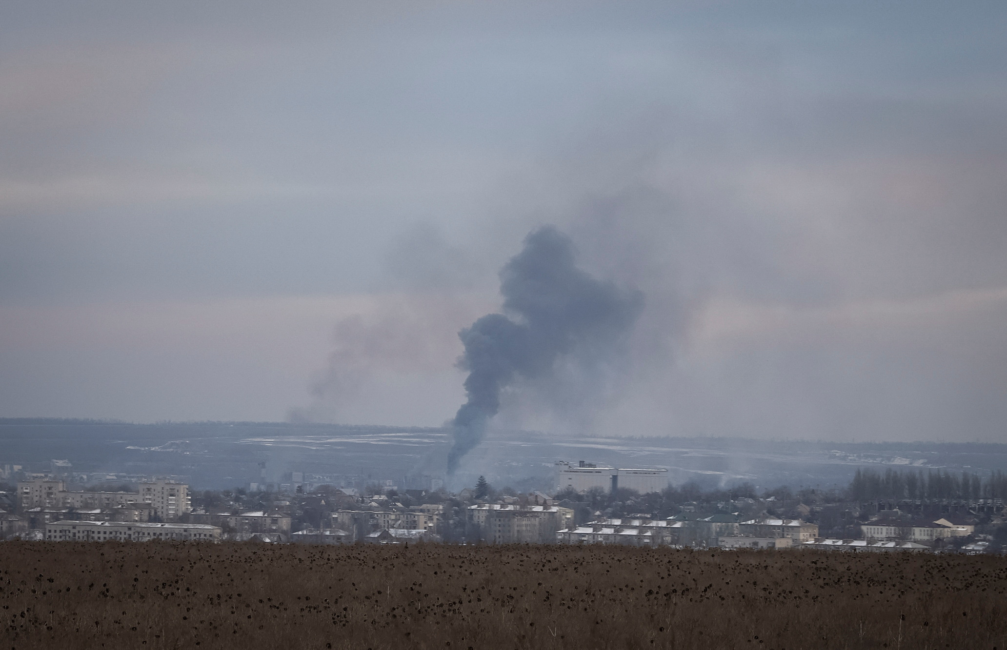 Smog is seen during a shelling in the front line city of Bakhmut