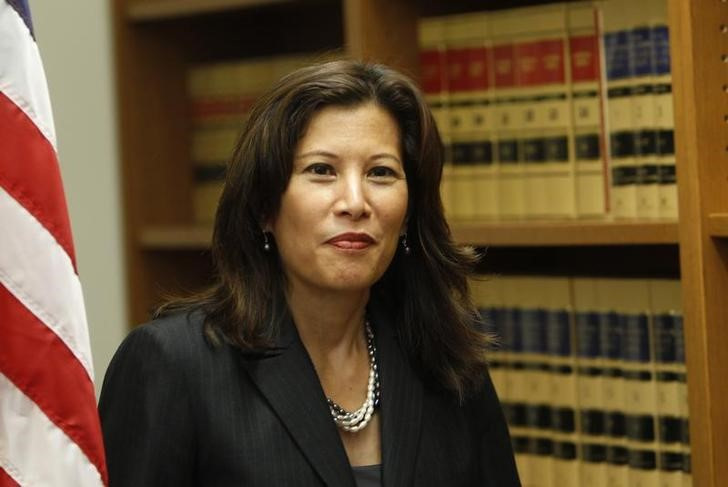 Appeals court justice Tani Cantil-Sakauye enters news conference in San Francisco