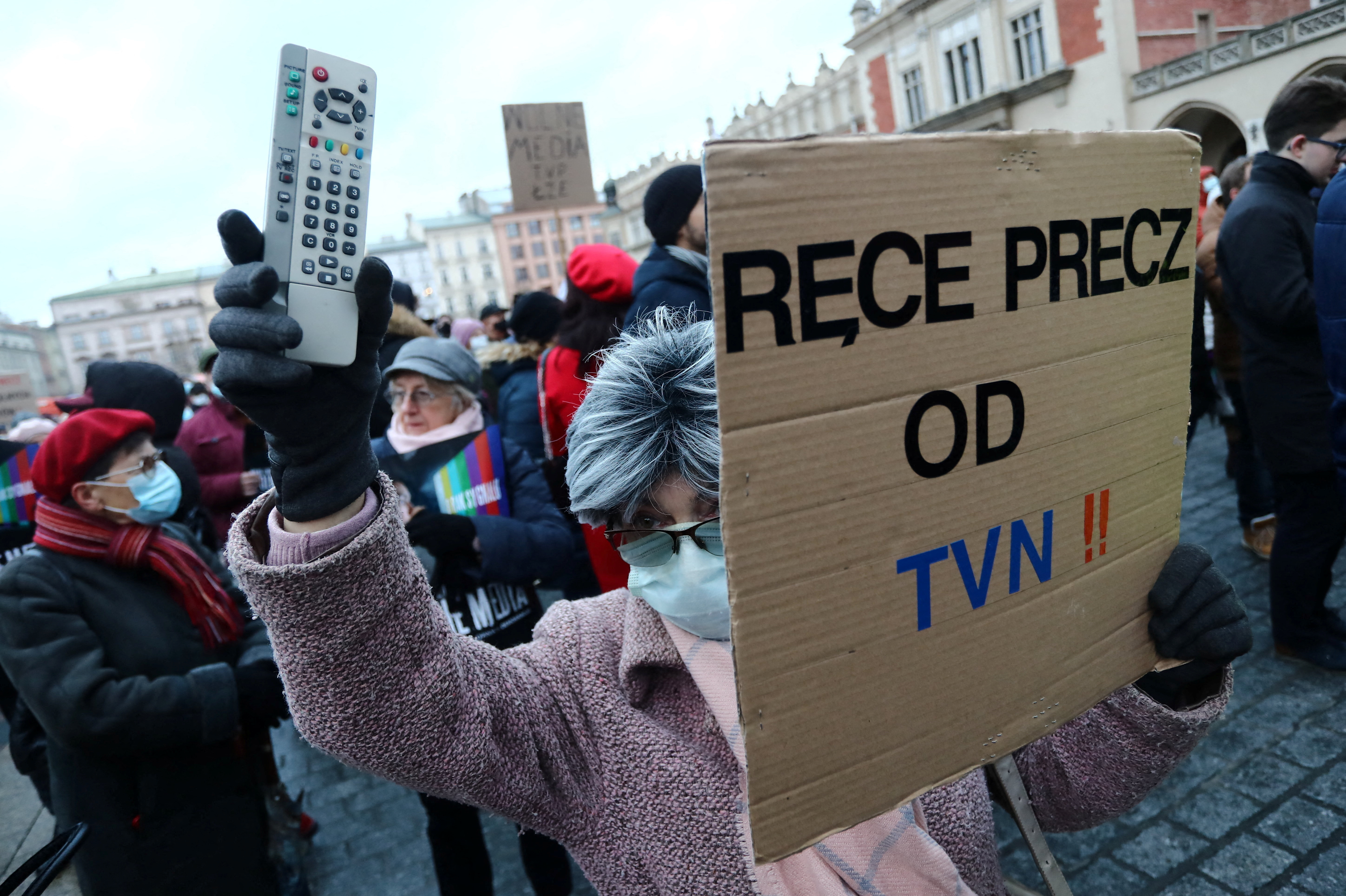 People protest against media law affecting U.S.-owned news channel in Krakow