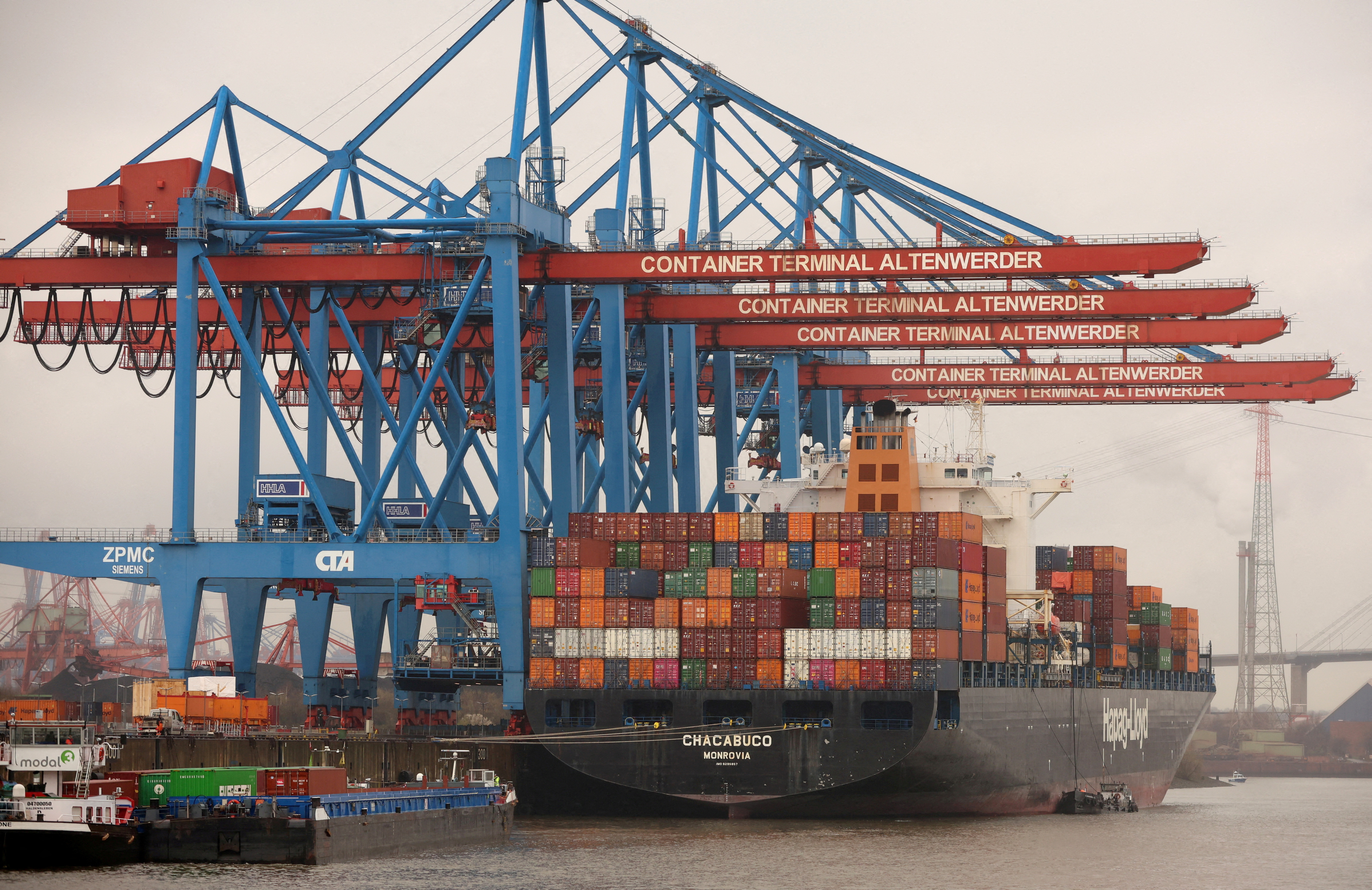 Containers are unloaded at the HHLA Container Terminal Altenwerder on the River Elbe in Hamburg, Germany
