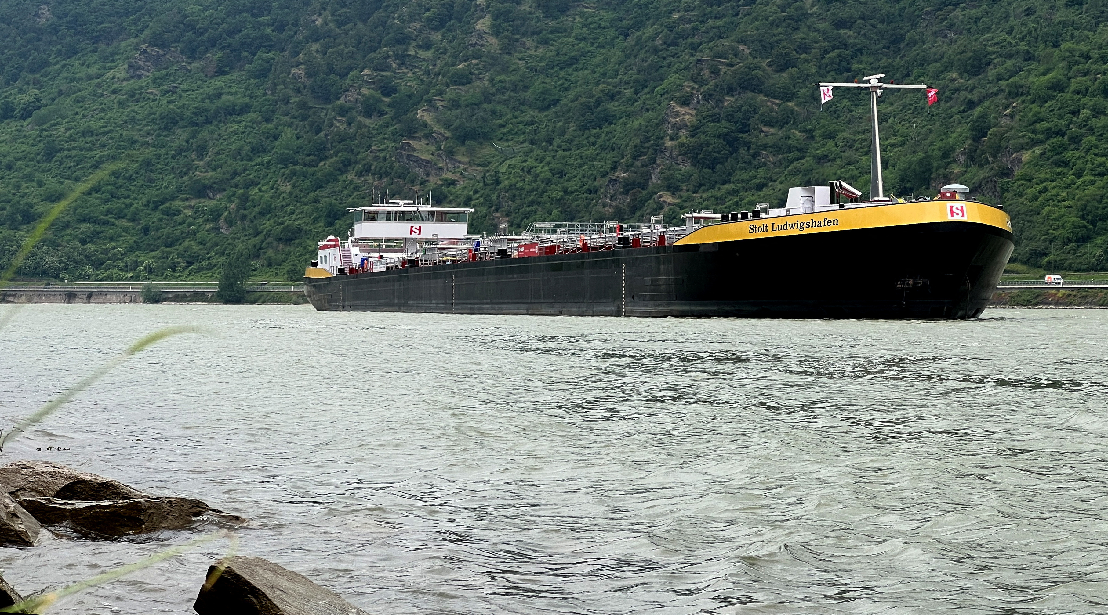 A special tanker, able to pass on the Rhine river even at low water levels sails past Bad Salzig