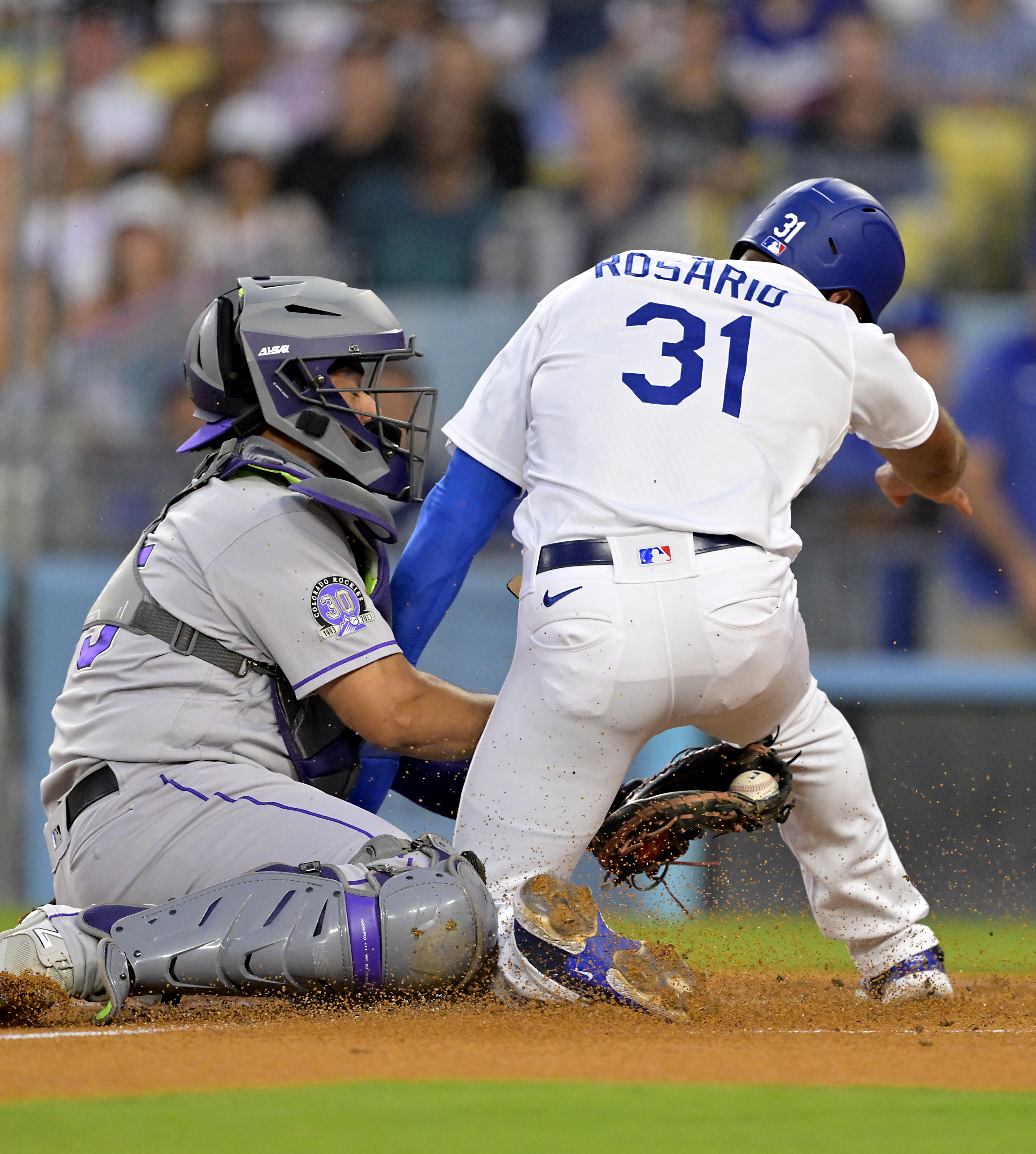 Dodgers use four-run sixth to tame Rockies, 6-1