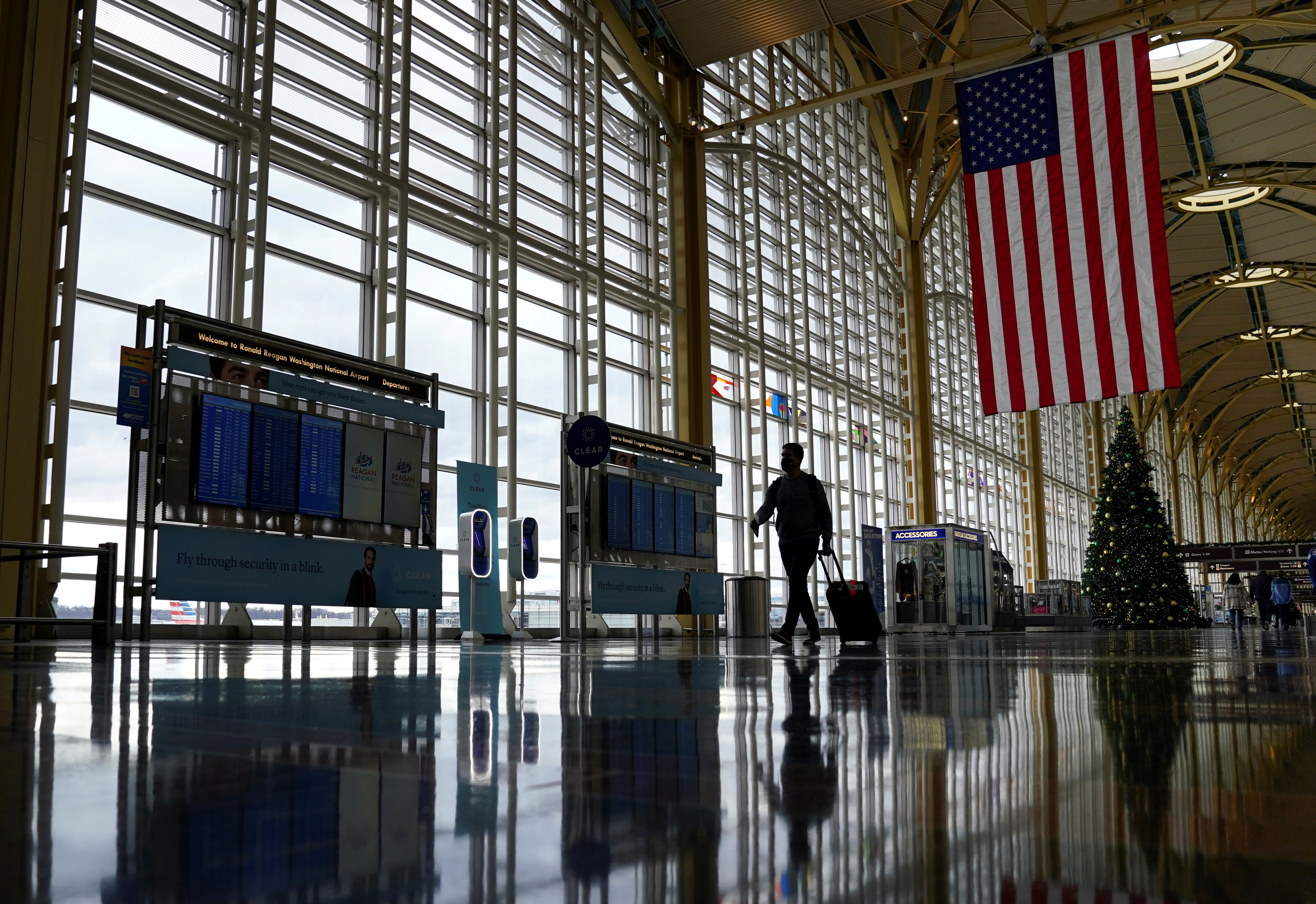 A passenger makes his way through Ronald Reagan Washington National Airport in Arlington, Virginia