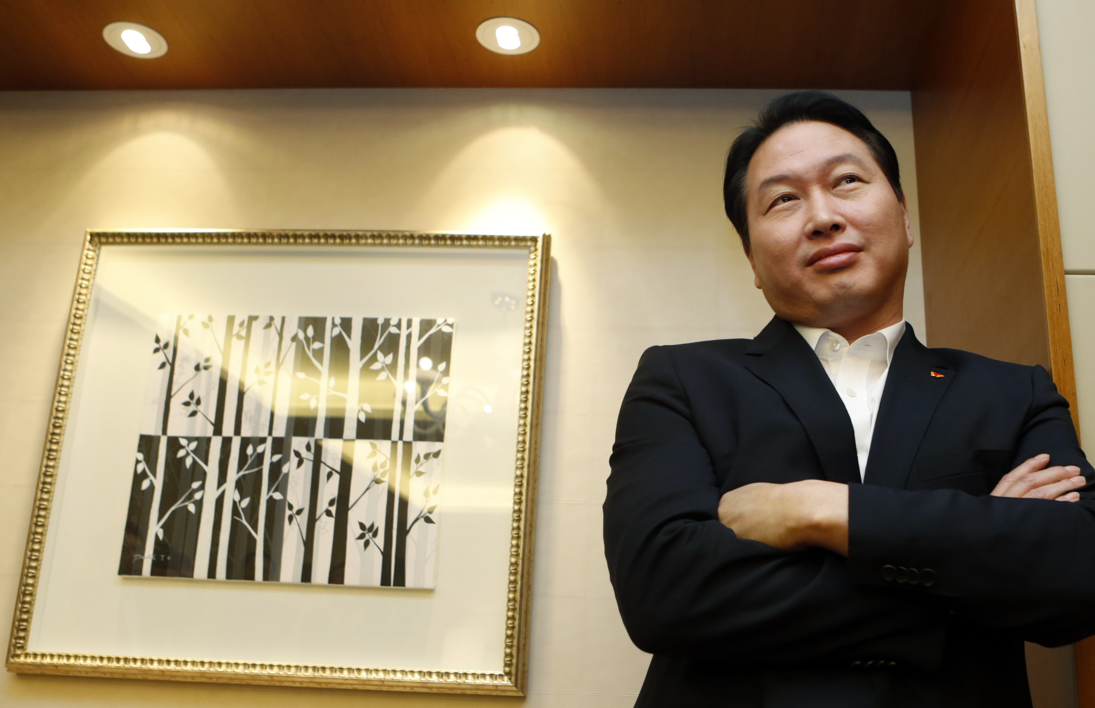 SK Group chief ordered to pay $1 bln in divorce case; shares in SK Inc ...