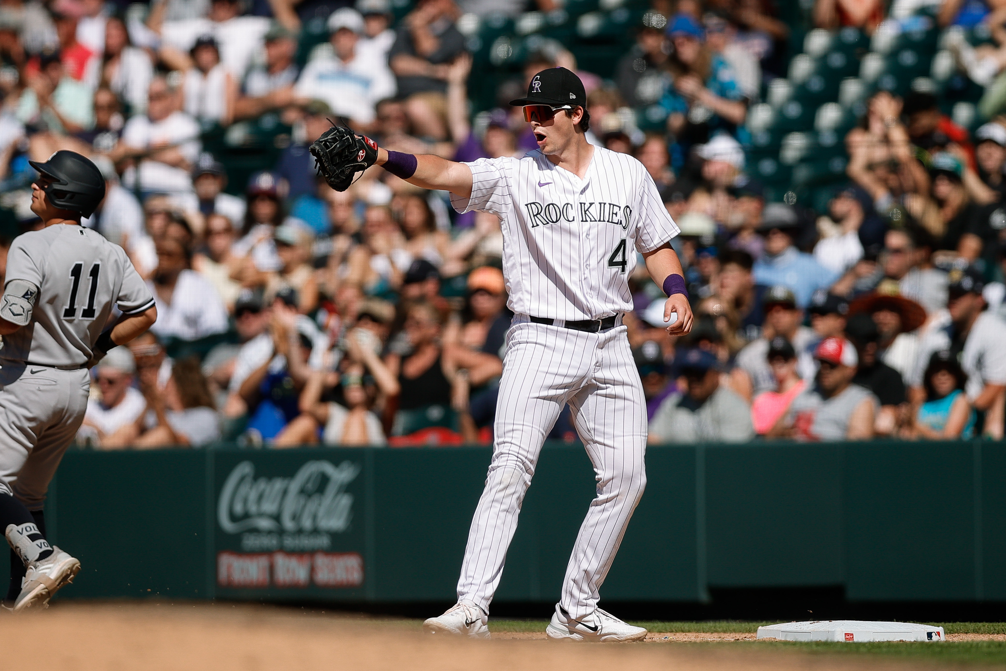 Alan Trejo's 11th-inning homer lifts Rockies past Yanks