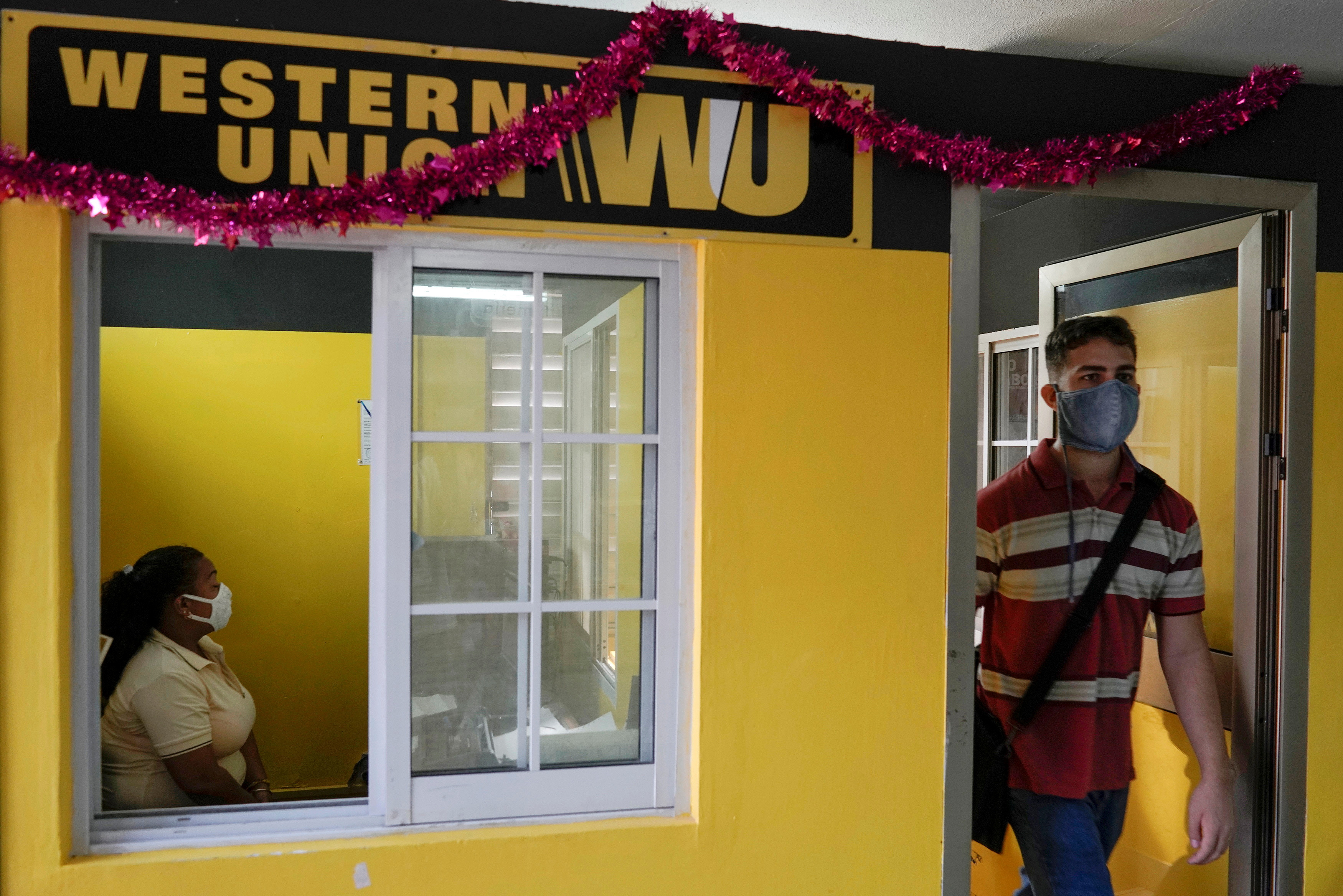 In blow to struggling Cubans, Western Union offices close as sanctions bite  | Reuters