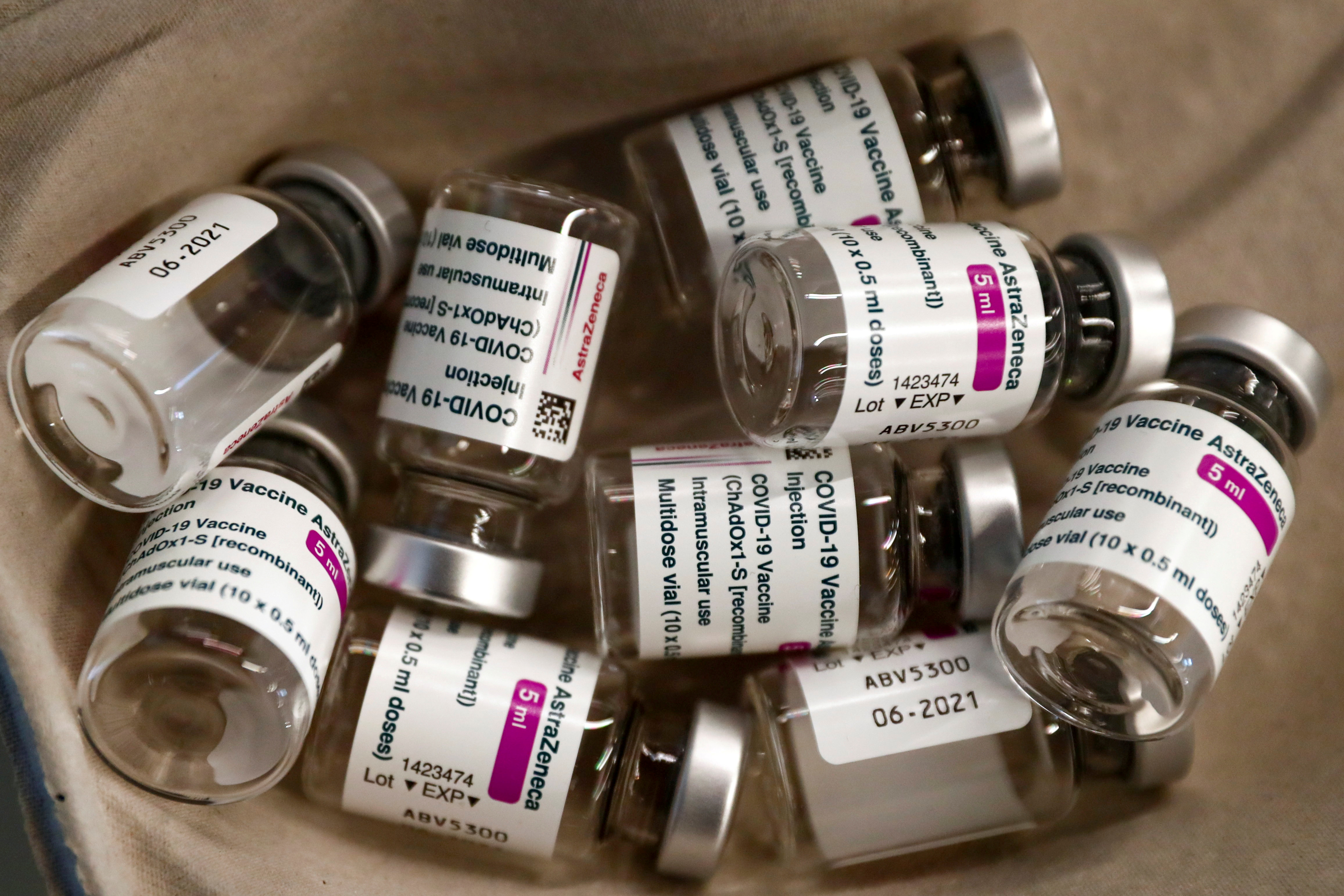 Empty vials of AstraZeneca COVID-19 vaccine are seen in a tray
