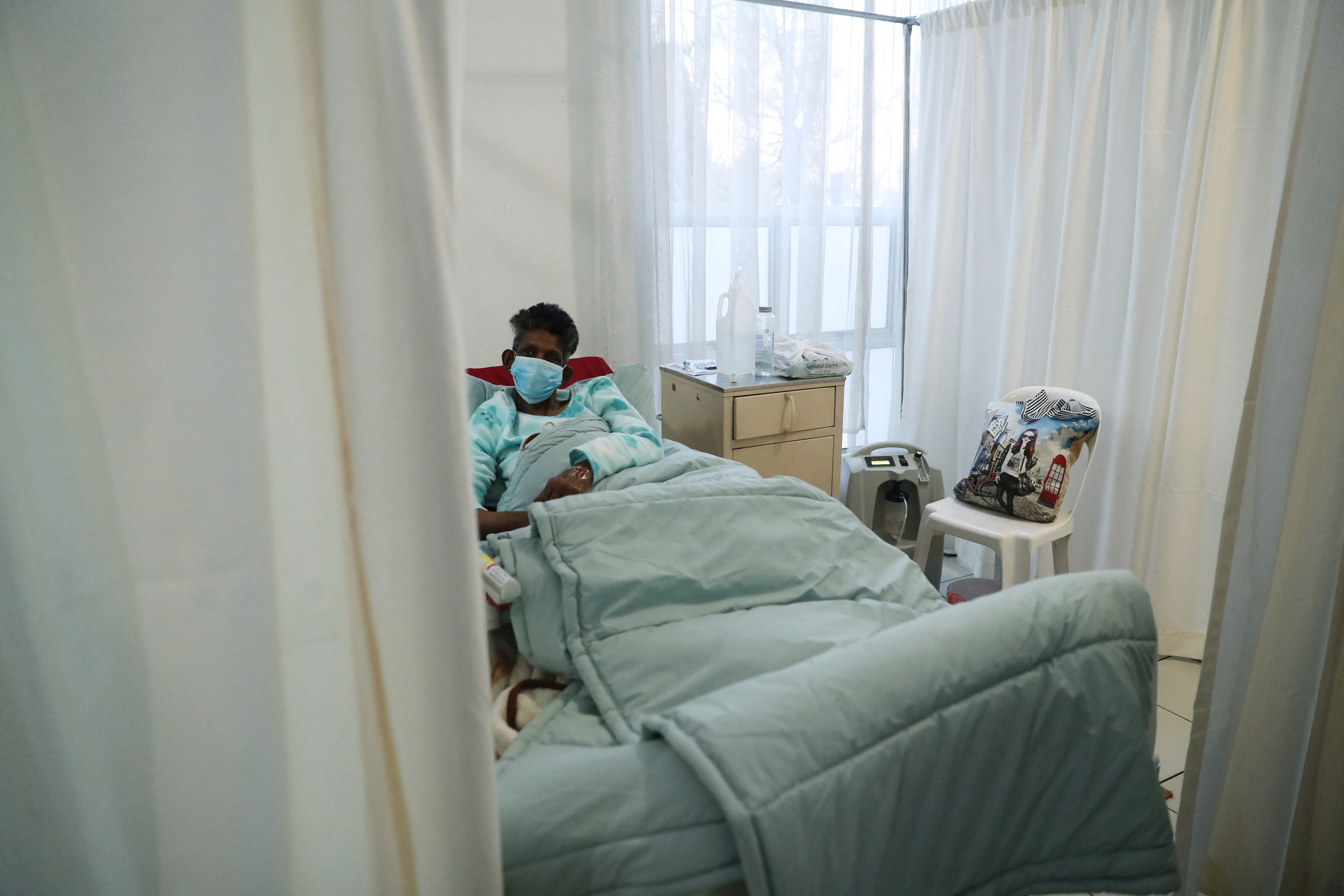 A patient being treated at a makeshift hospital run by charity organisation The Gift of the Givers, during the coronavirus disease (COVID-19) outbreak in Johannesburg
