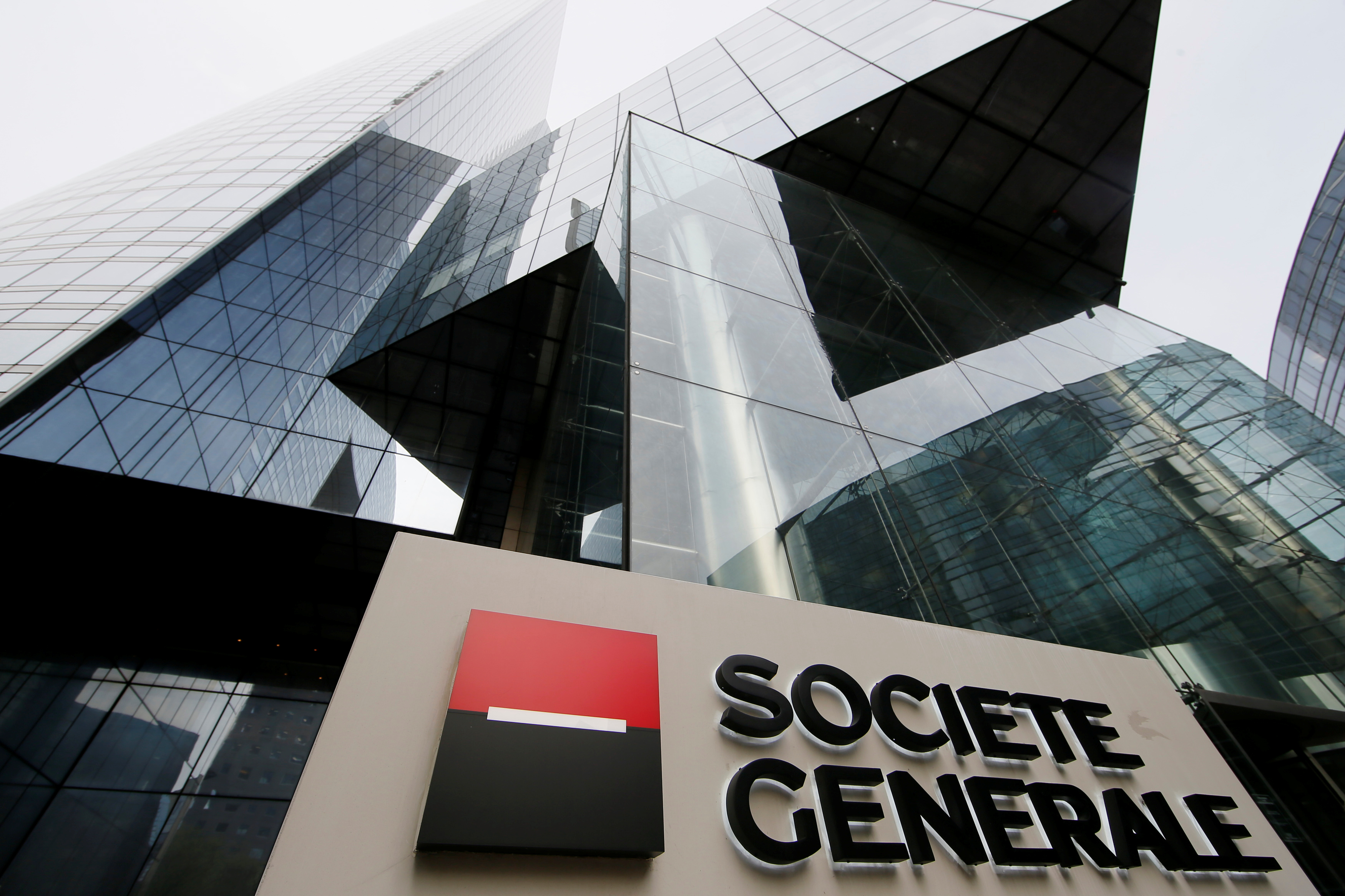 The logo of the French bank Societe Generale is seen in front of the bank's headquarters building at La Defense business and financial district in Courbevoie near Paris