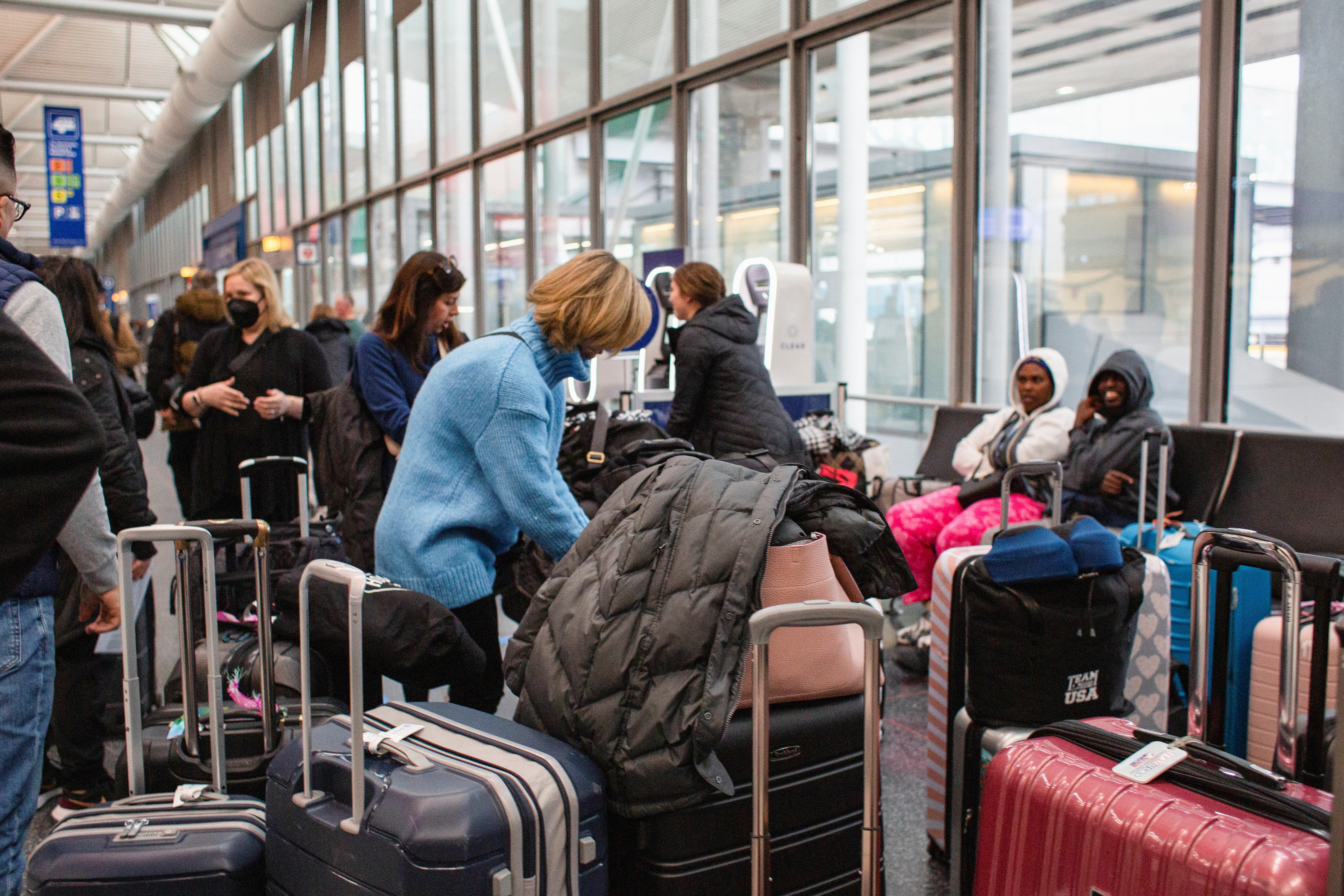 Passengers wait for the resumption of flights at O'Hare International Airport