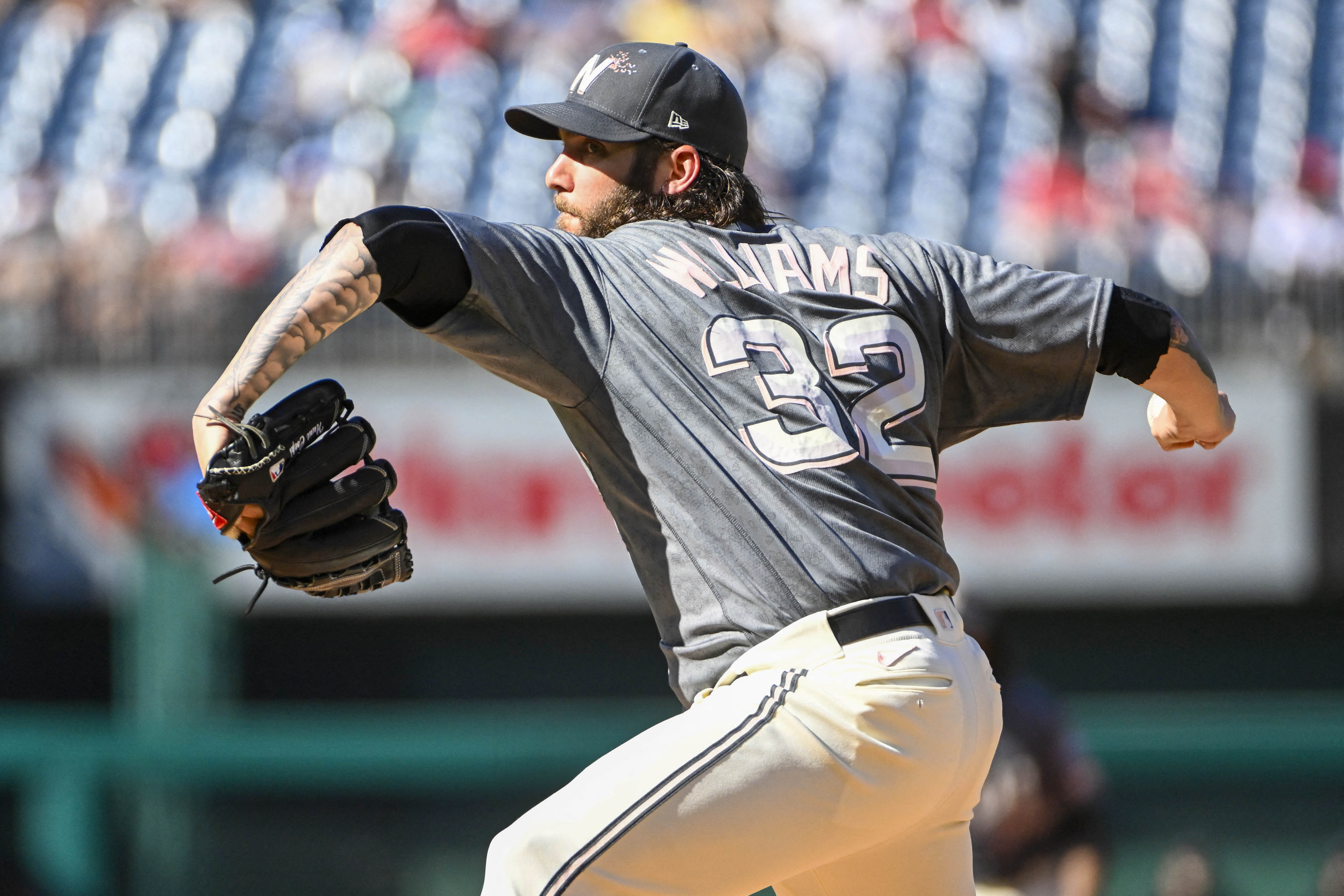 Cueto wins in his return as Burger hits 2 of the Marlins' 4 home runs in  win over the Nationals