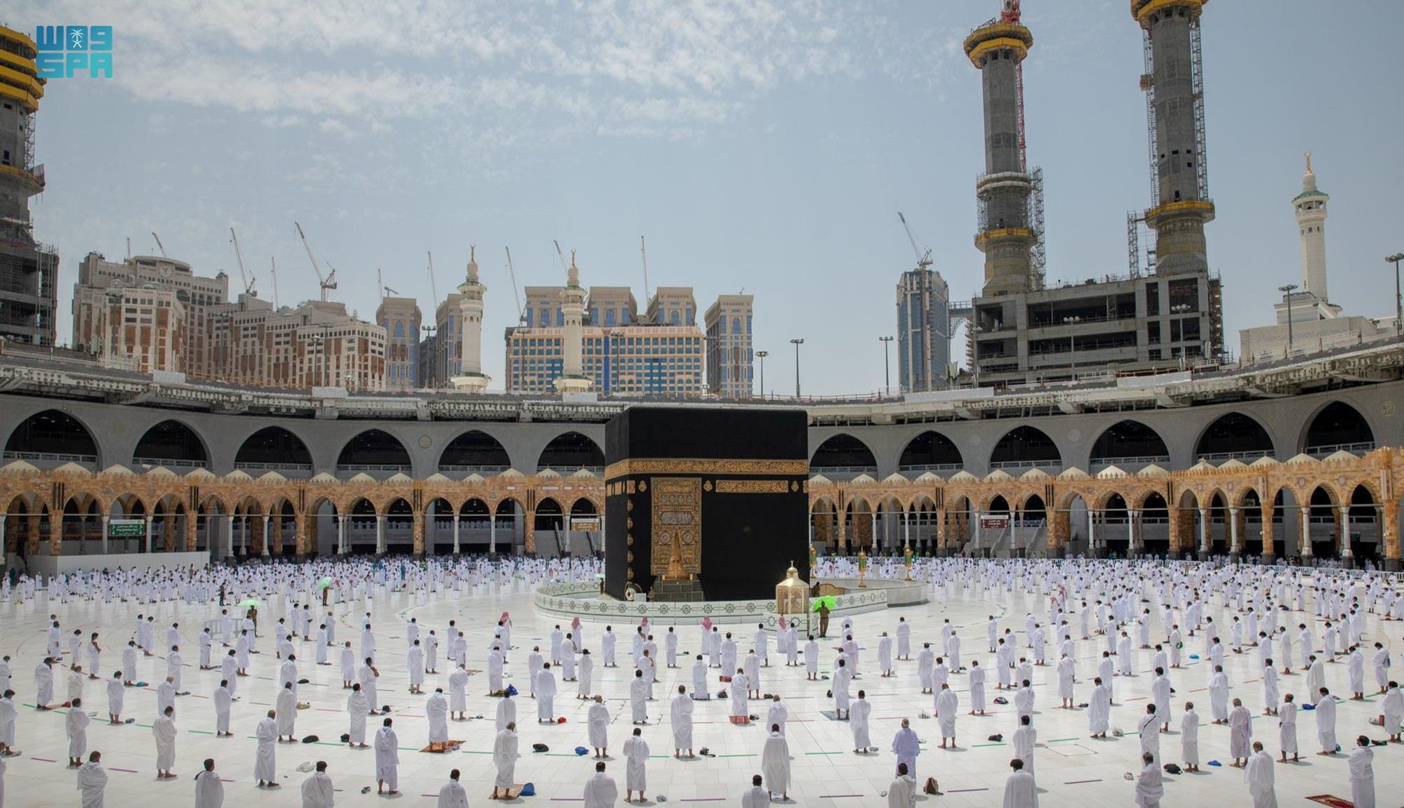 Muslims perform Friday prayers while practicing social distancing in the Grand Mosque during the holy month of Ramadan, in the holy city of Mecca, Saudi Arabia, April 16, 2021. Saudi Press Agency/Handout via REUTERS