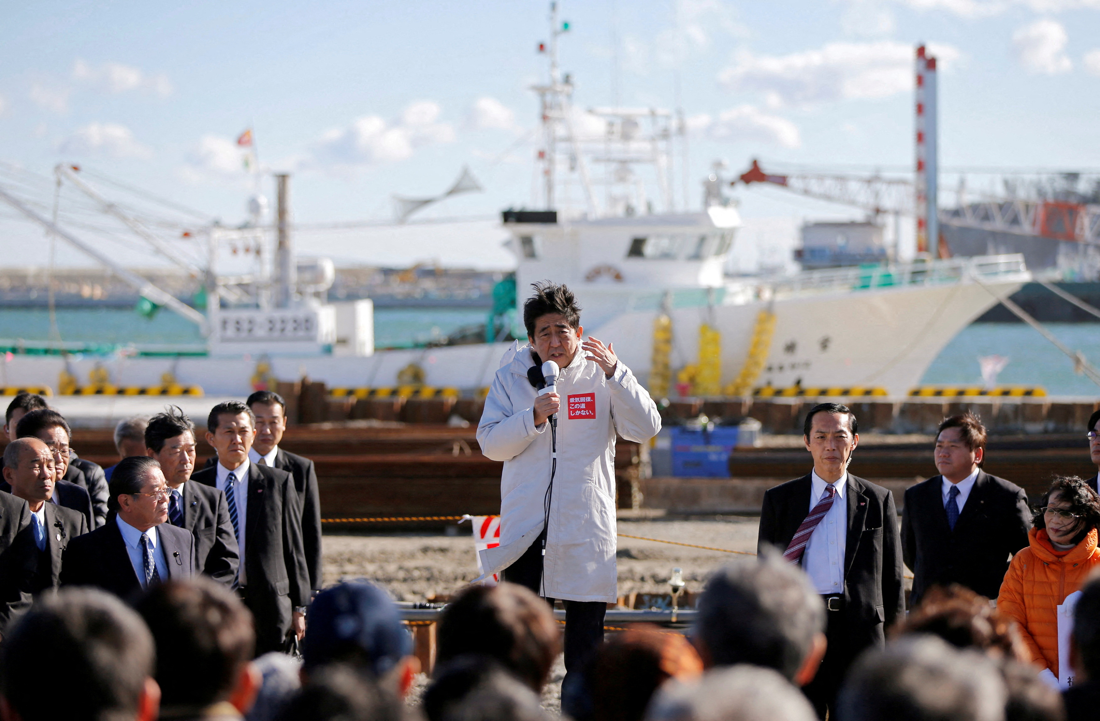 Japan PM Abe speaks to voters during his official campaign kick-off for the Dec 14 lower house election, in Soma