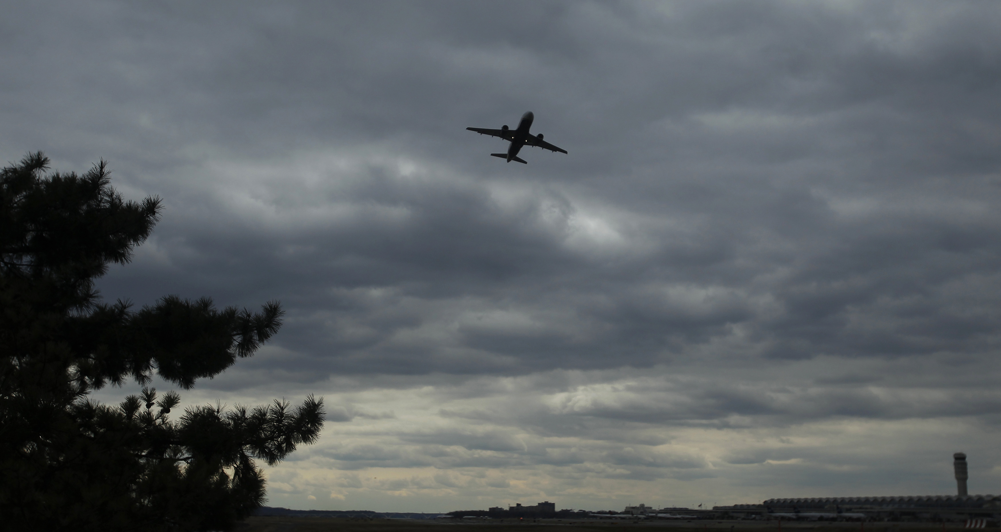 A passenger jet lifts off at Reagan National Airport in Washington