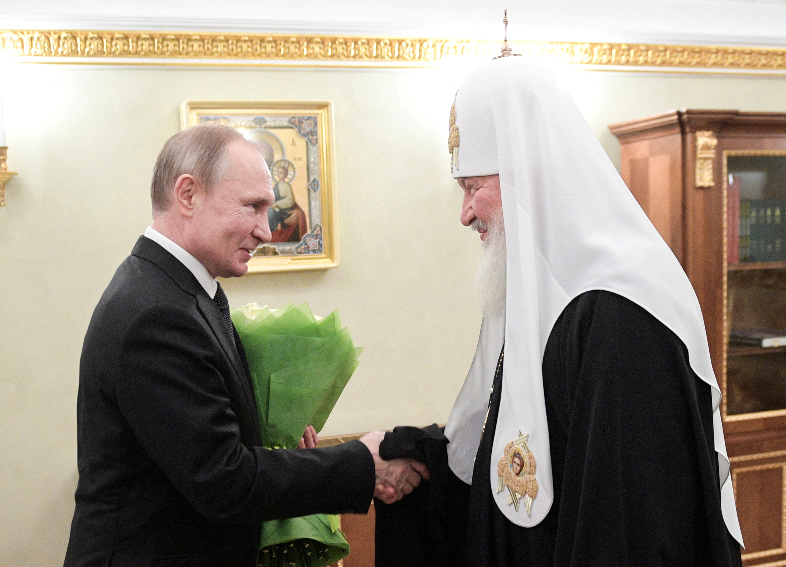 Russian President Vladimir Putin congratulates Patriarch Kirill of Moscow and All Russia on the day of the 11th anniversary of his enthronement in Moscow