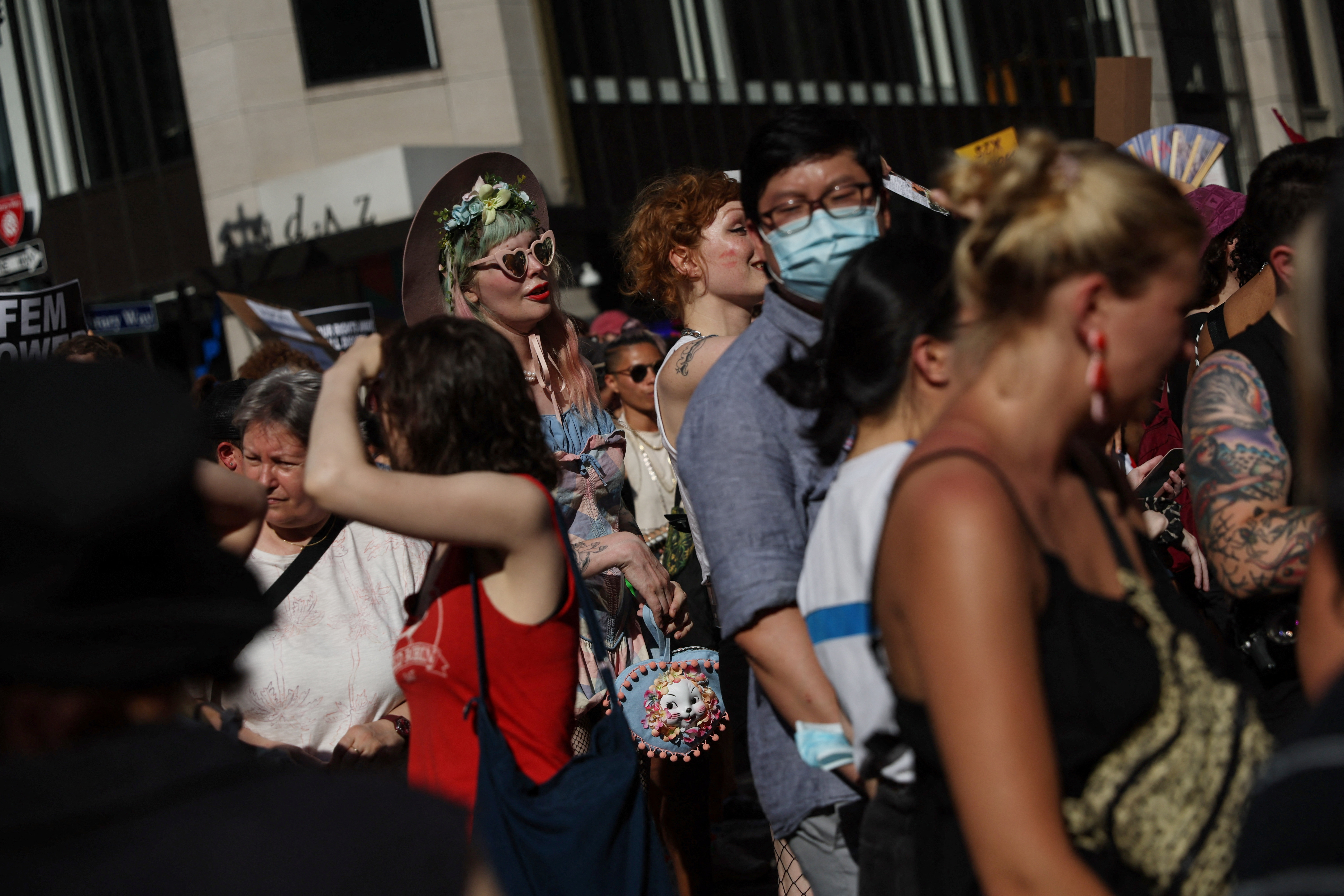 People walk during the 30th Annual NYC Dyke March in New York City
