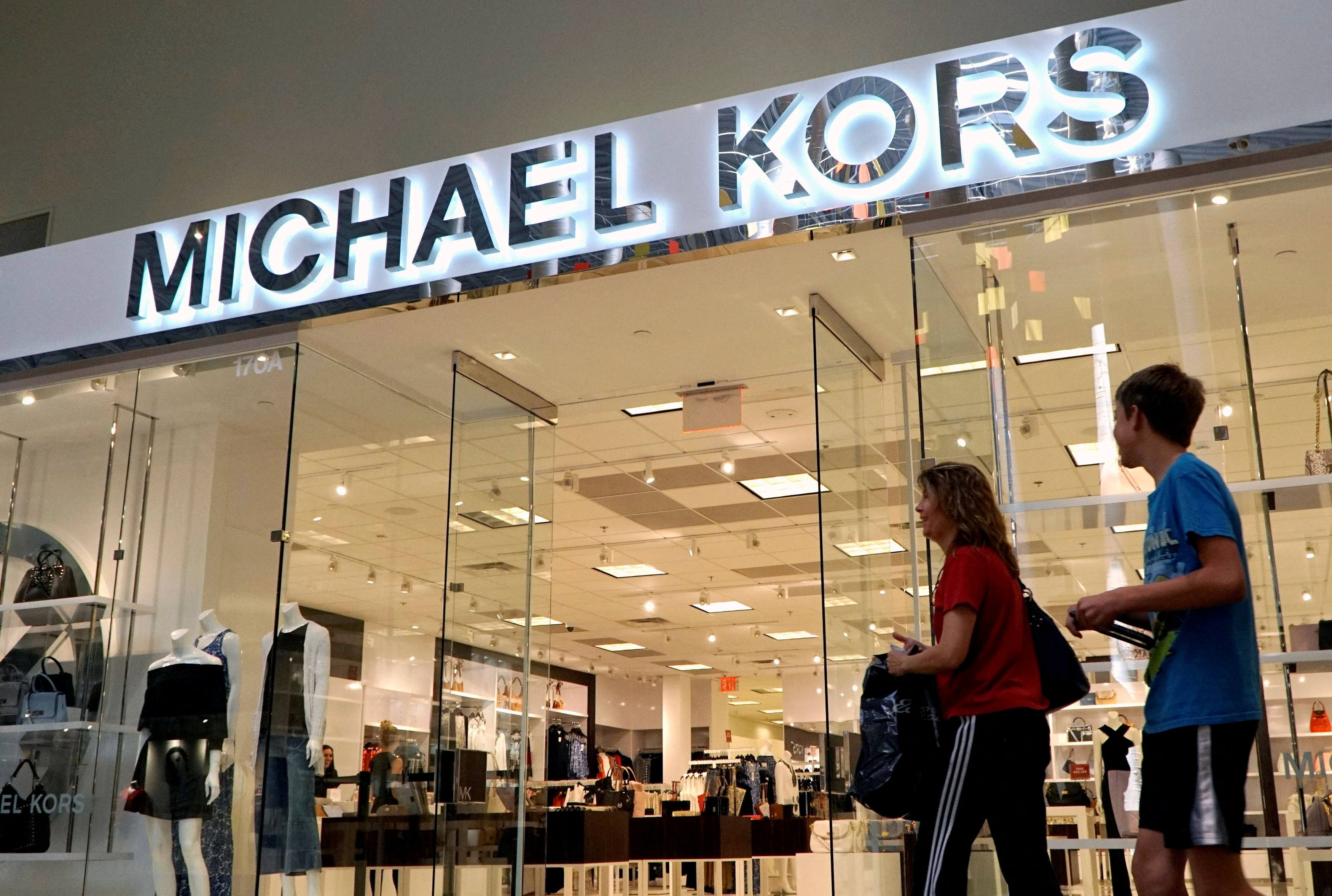 FILECustomers are shopping at a fashion boutique of Michael Kors MK at  Jing An Kerry Centre in Shanghai China 7 May 2014 American light lux  Stock Photo  Alamy