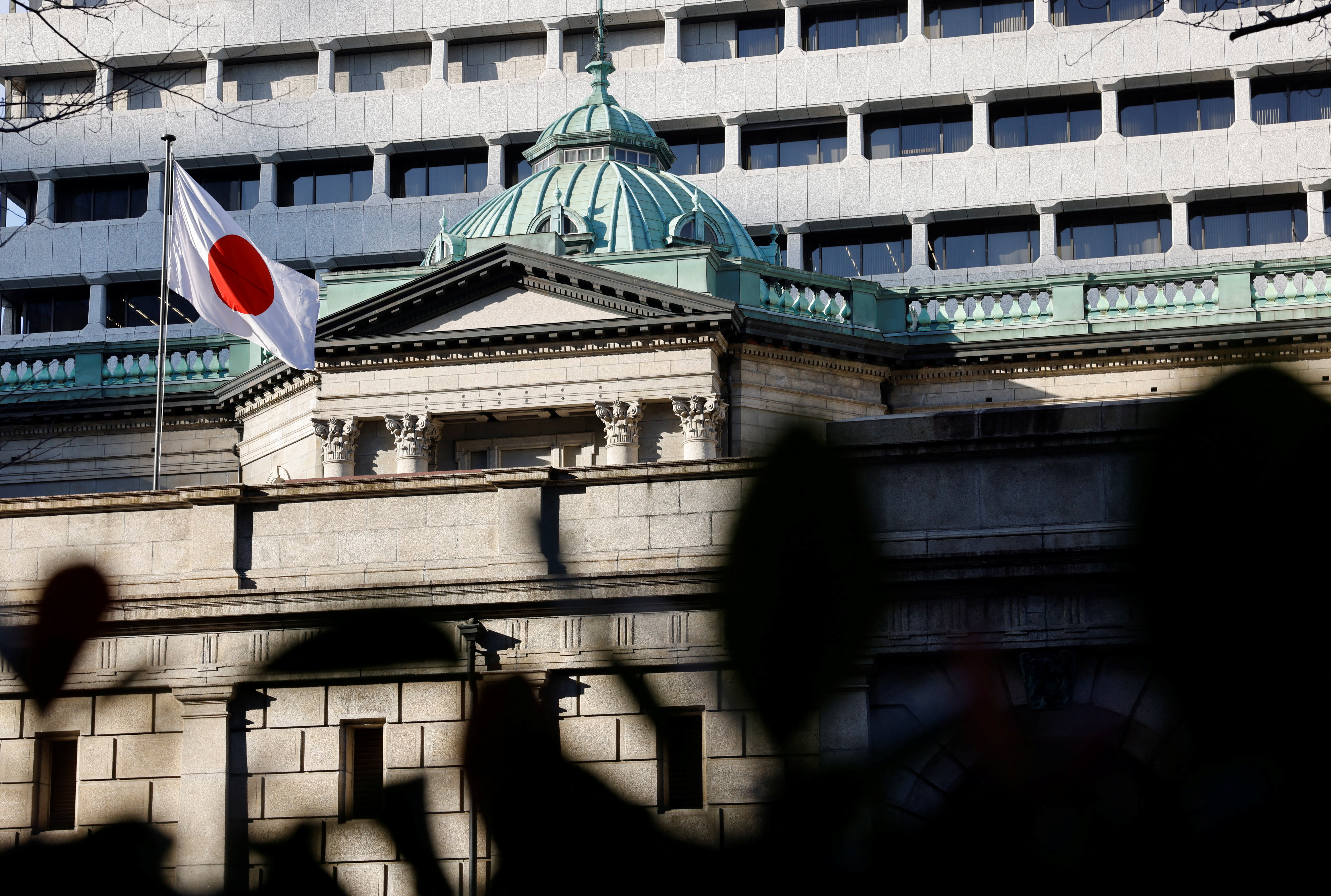 Bank of Japan raises rates to 30-year high, signals more hikes | Reuters
