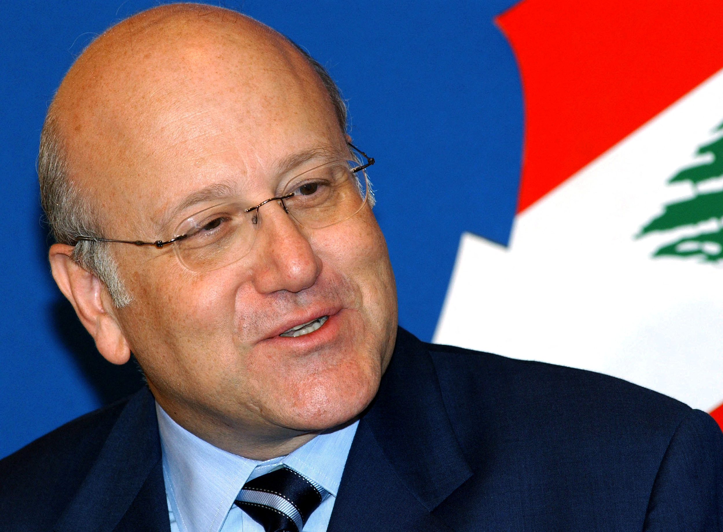 Lebanese Prime Minister Mikati talks to reporters at Baabda presidential palace in Beirut