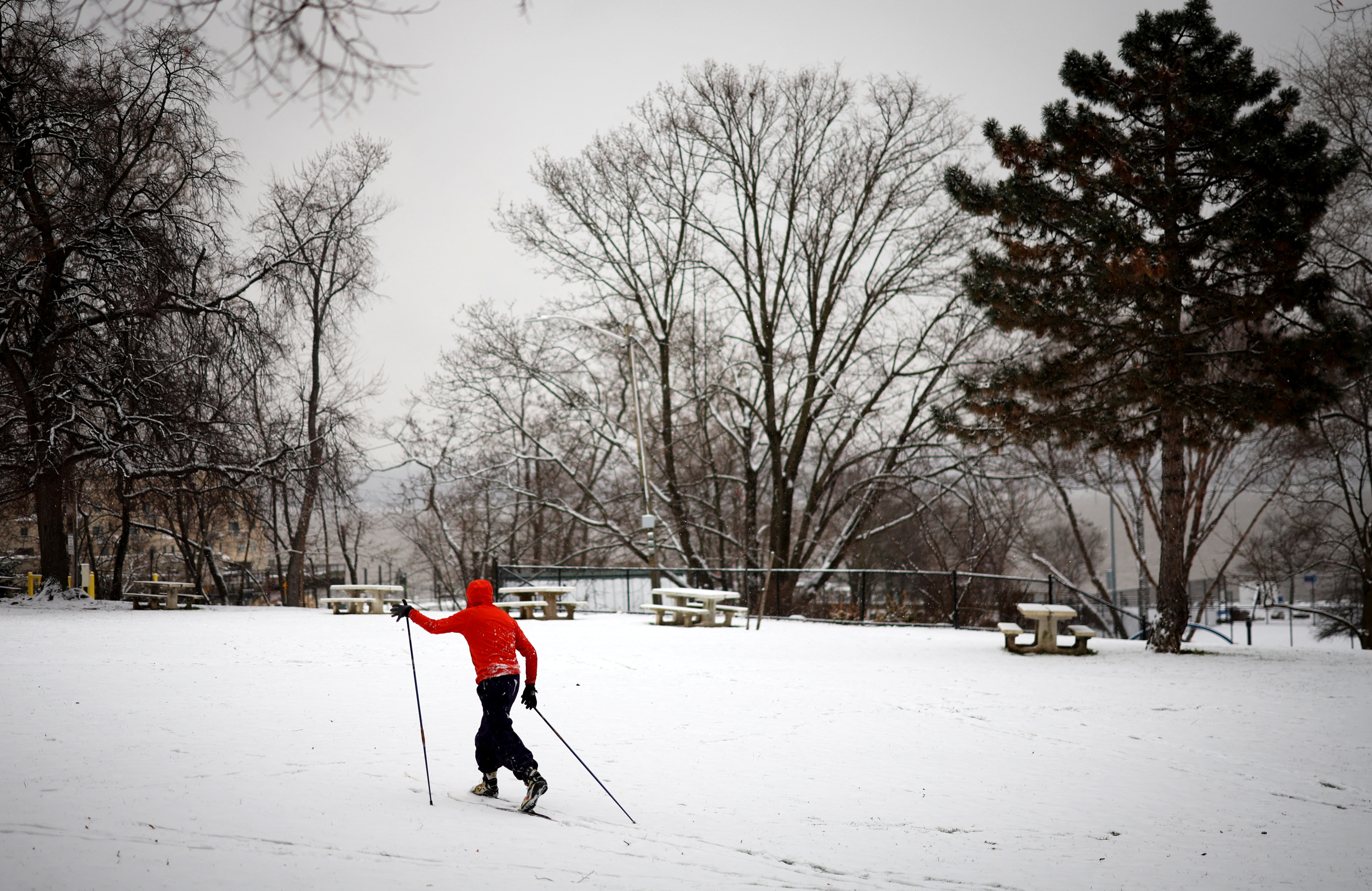 Man skis during winter weather in New York City suburb of Nyack