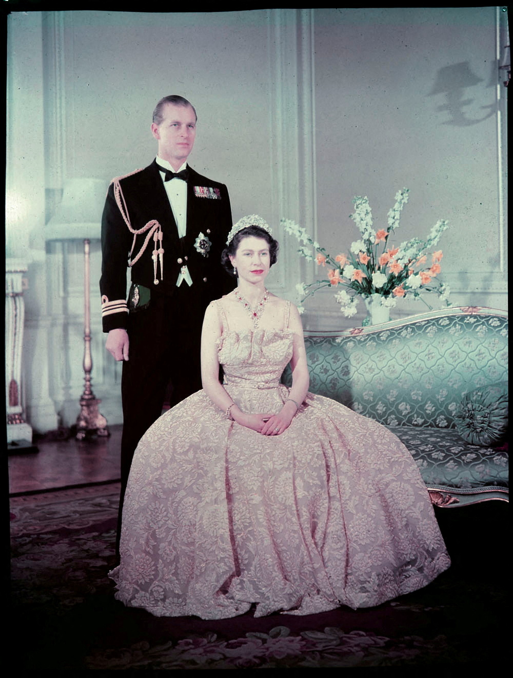 Queen Elizabeth II and Prince Philip pose  for a portrait at Buckingham Palace in London
