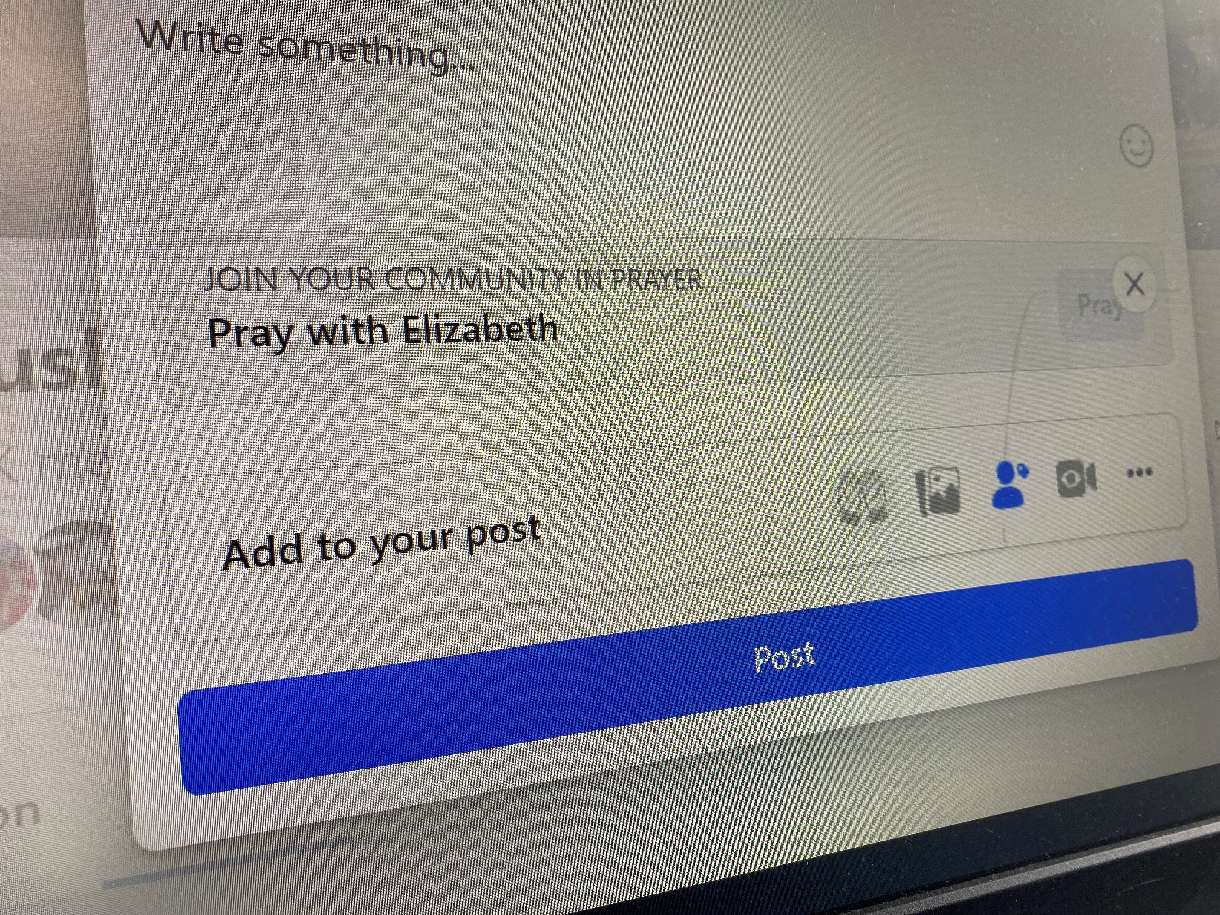 Facebook's prayer request feature in a U.S. Facebook group is shown in this photo illustration taken in New York City