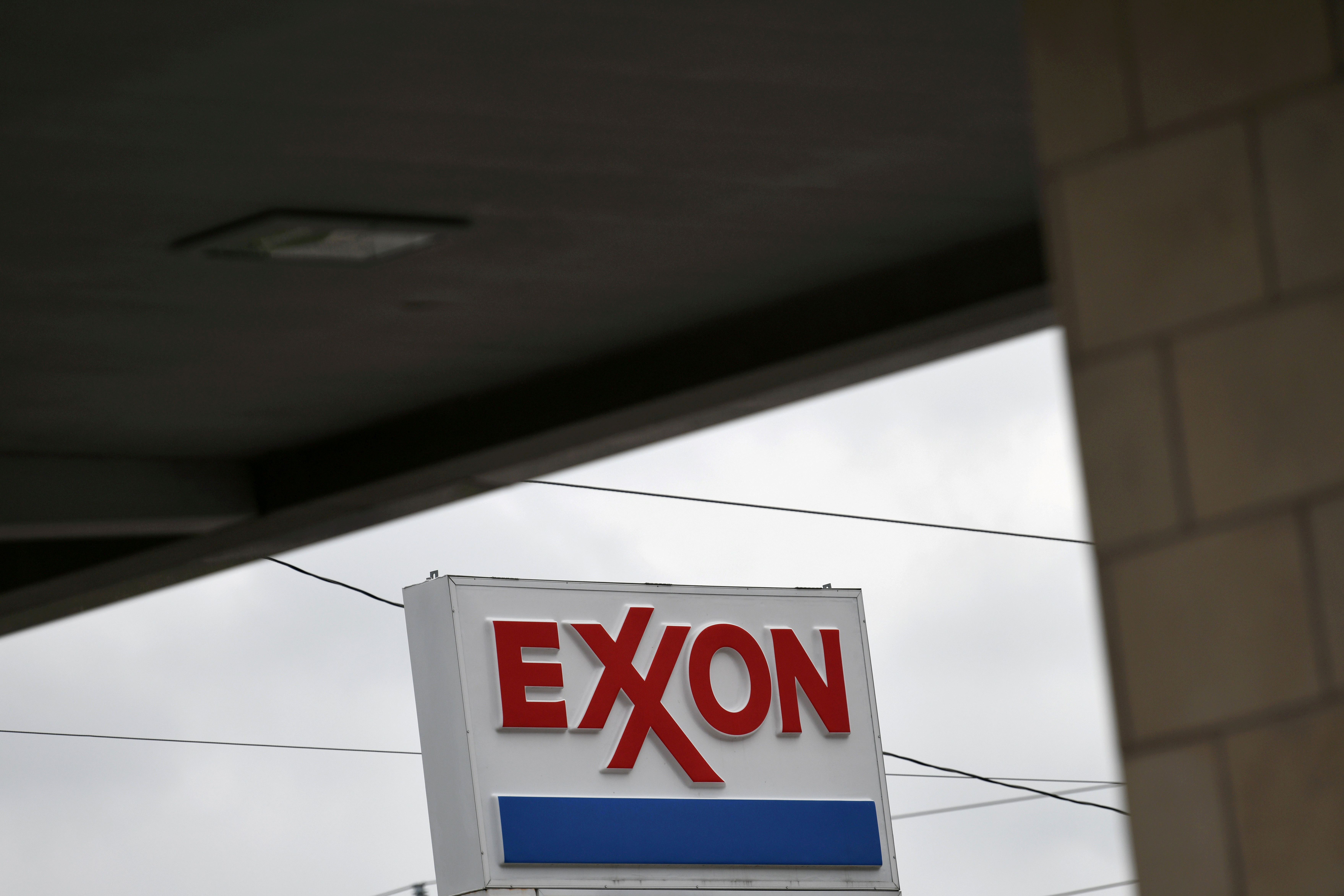 An Exxon gas station is seen in Houston
