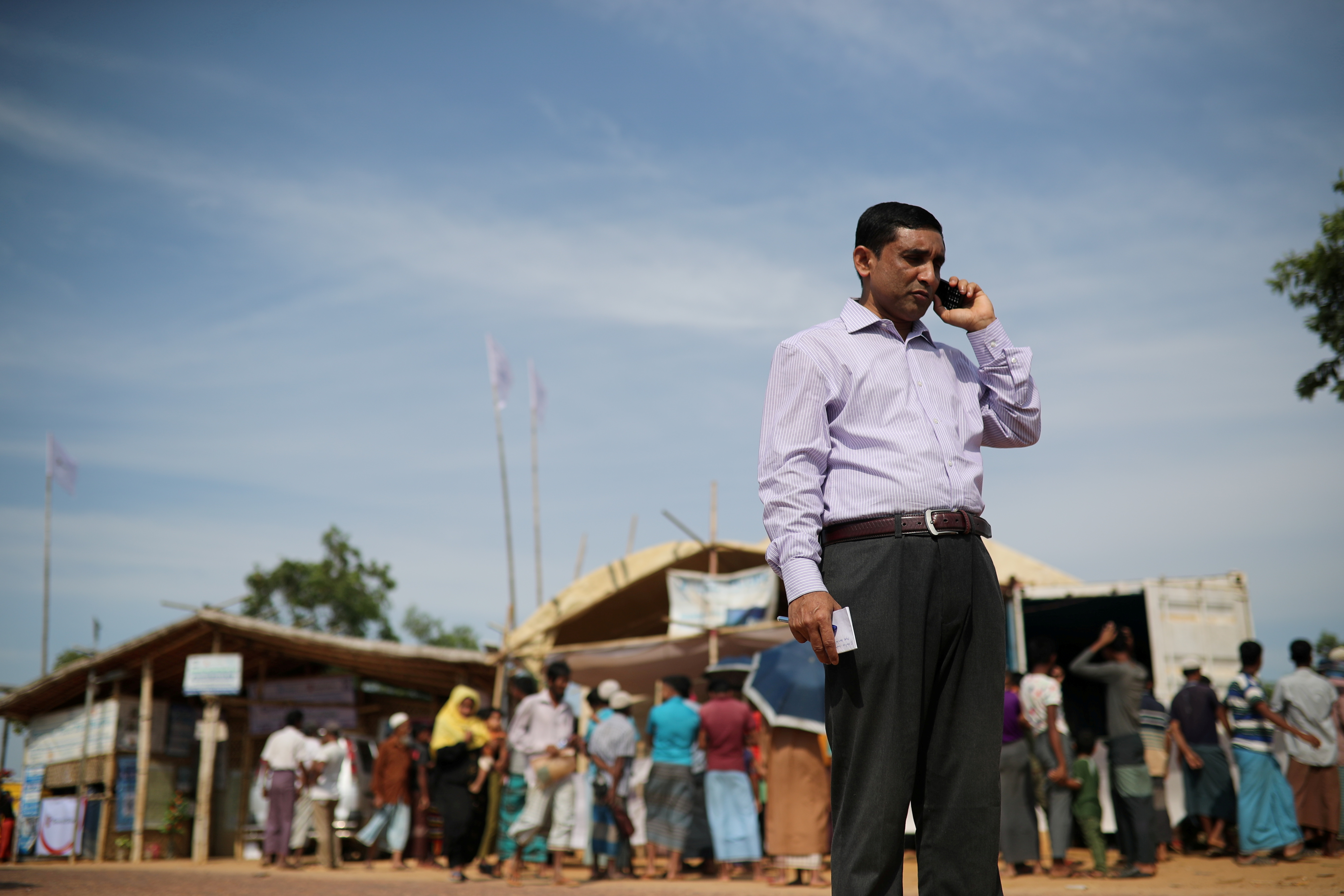 Mohib Ullah, a leader of Arakan Rohingya Society for Peace and Human Rights, talks on the phone in Kutupalong camp in Cox's Bazar