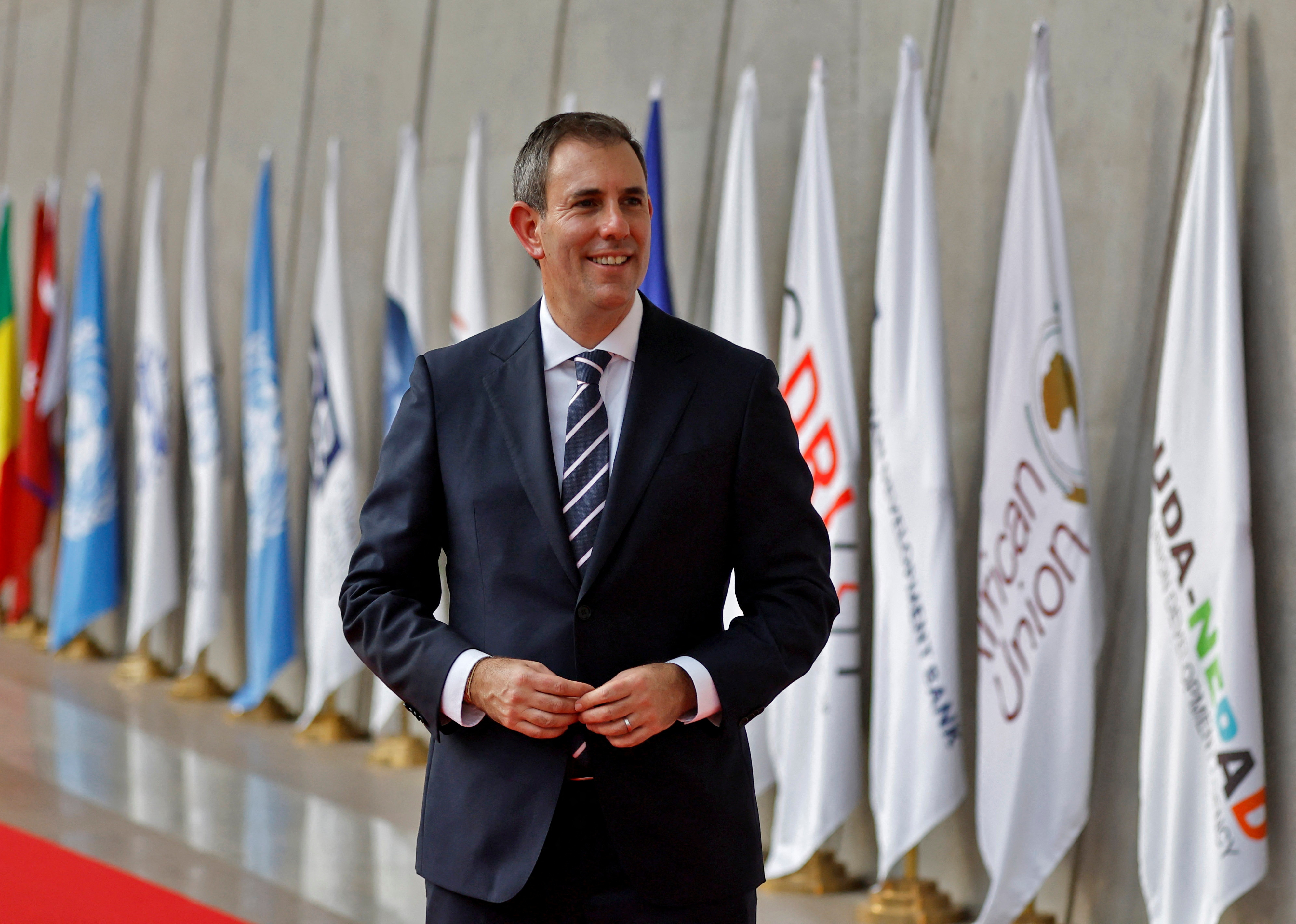 Australian Treasurer Chalmers poses for a photograph as he arrives to attend a G20 finance ministers' and Central Bank governors' meeting at Gandhinagar
