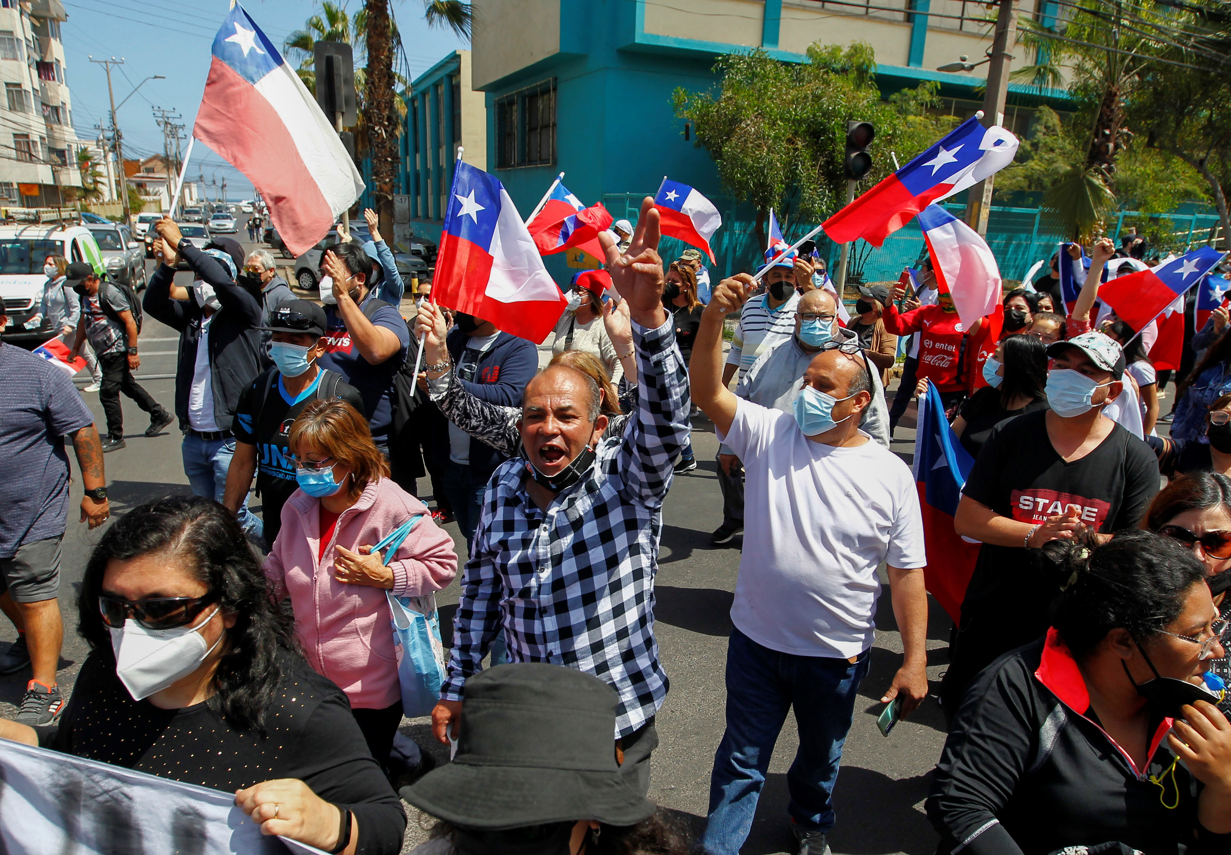 Chilean demonstrators take part in a rally against the migrants in Iquique, Chile, September 25, 2021. REUTERS/Alex Diaz 