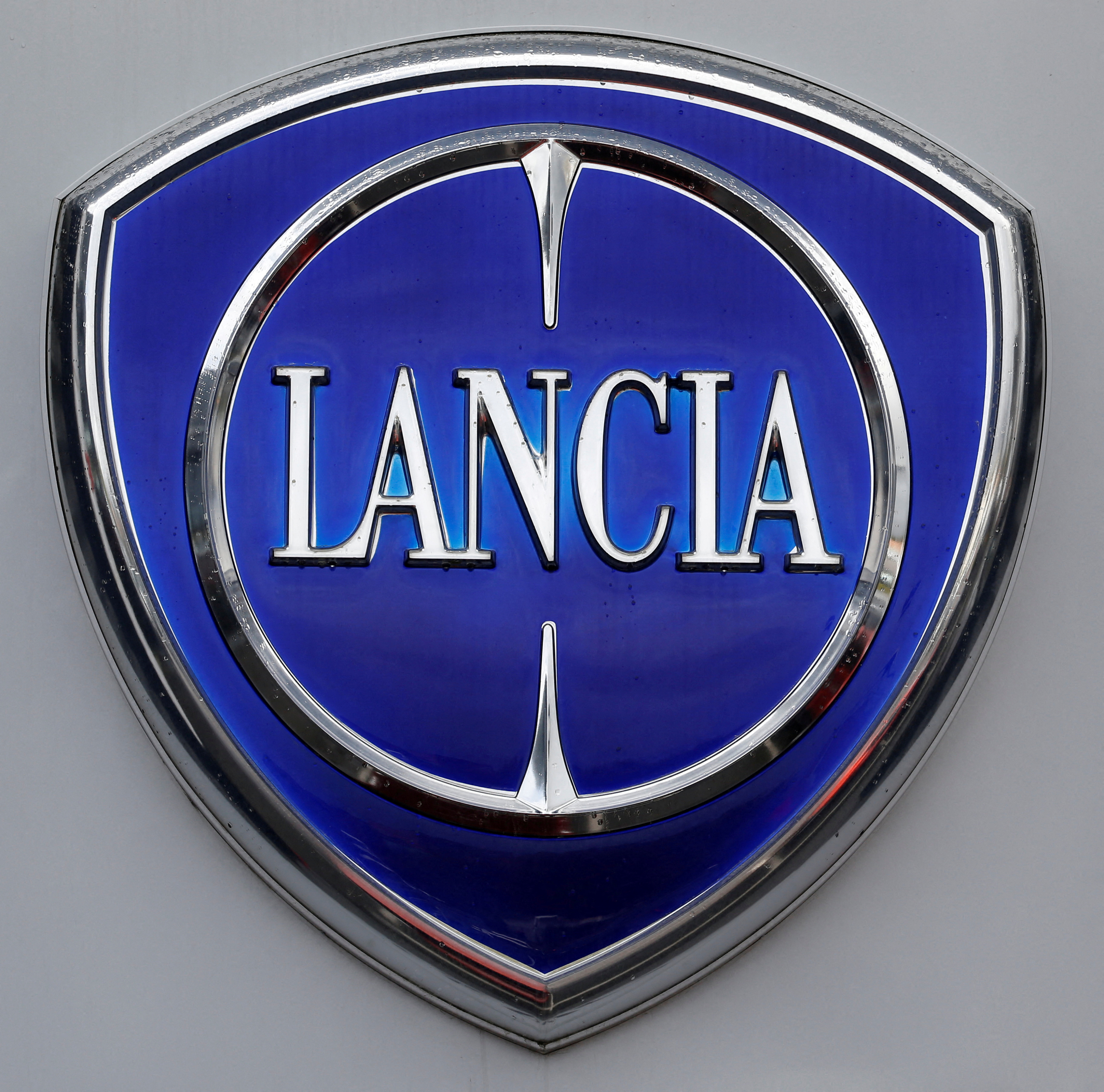 A Lancia logo is seen at a showroom of a dealership in Merignac