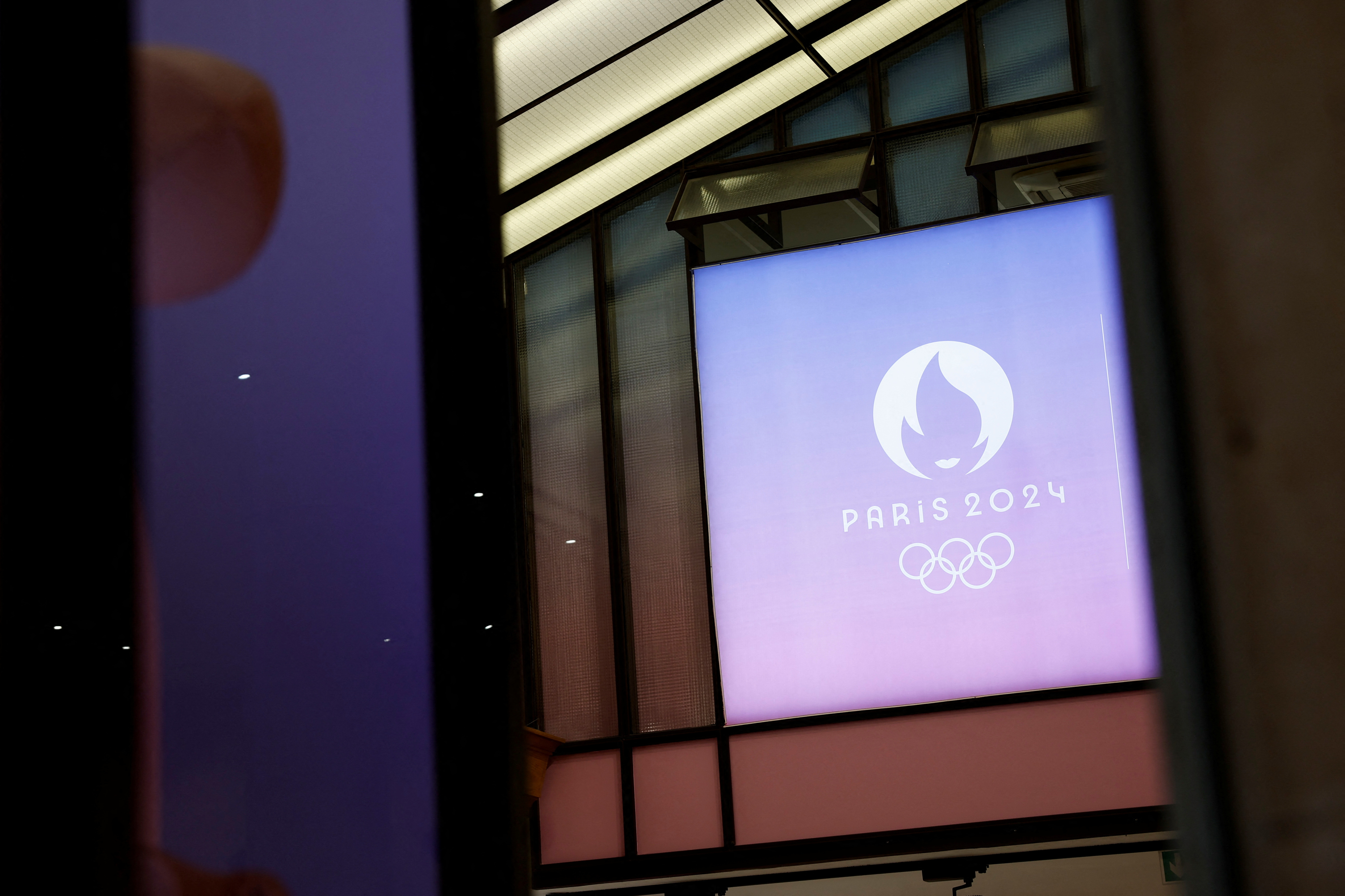 Logo of the Paris 2024 Olympic and Paralympic Games is seen on an official Paris 2024 store in Paris
