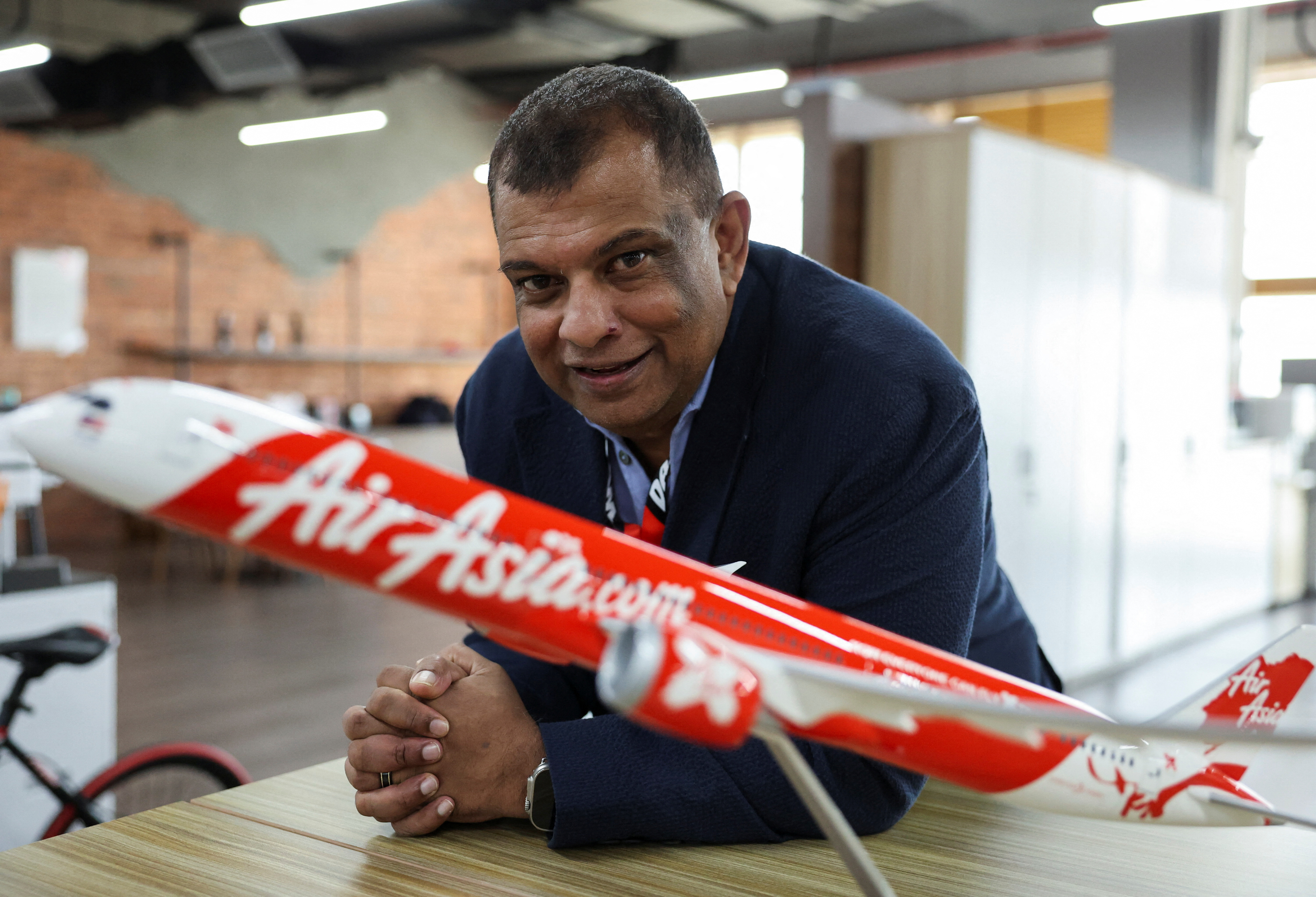 Tony Fernandes, the CEO of AirAsia's parent company, Capital A, attends an interview with Reuters in Sepang