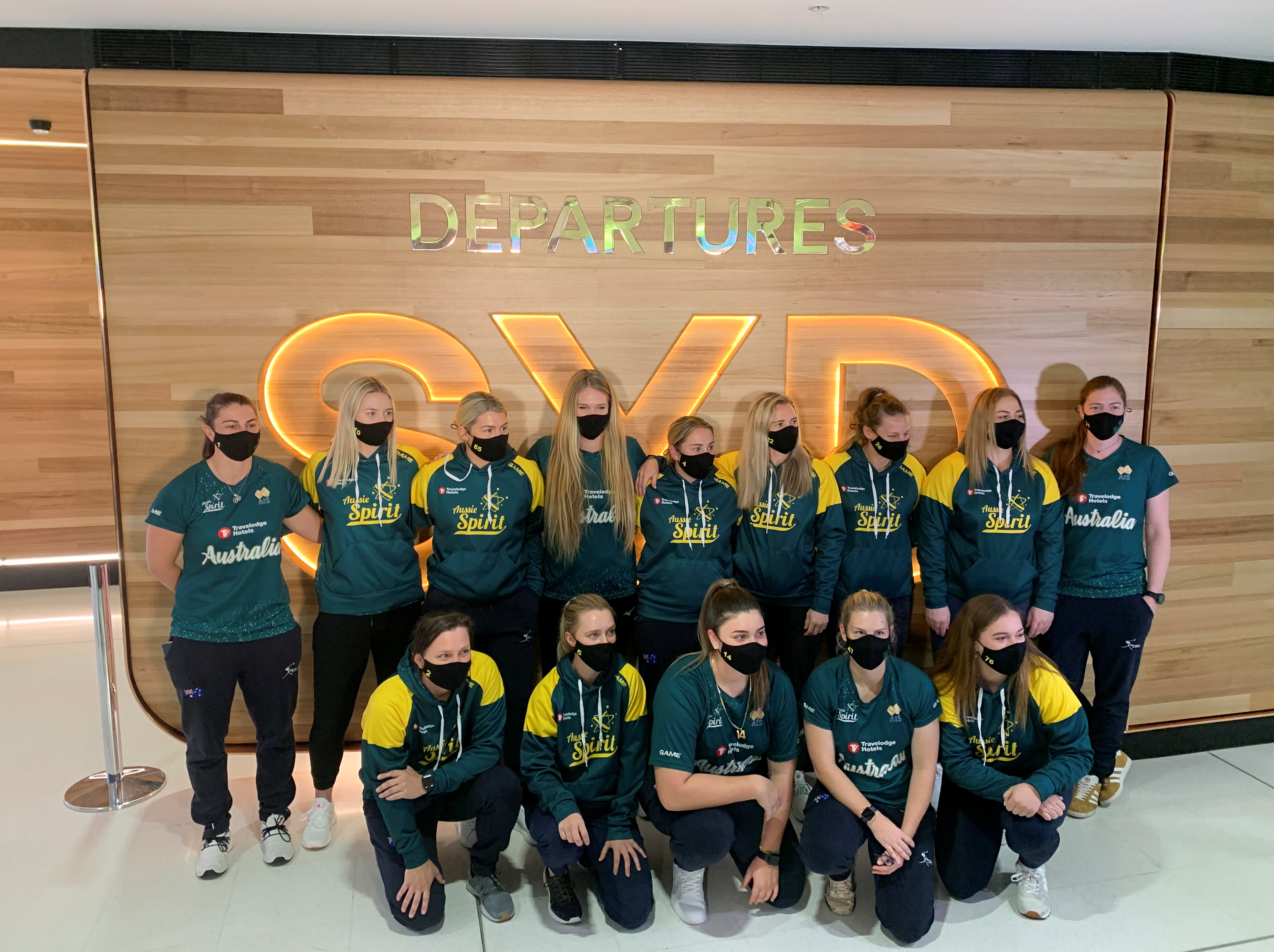 Members of Australia’s Olympic softball squad at Sydney Airport on May 31, 2021 before their departure for a pre-Games training camp in Ota, Gunma Prefecture, Japan.  REUTERS/Nick Mulvenney