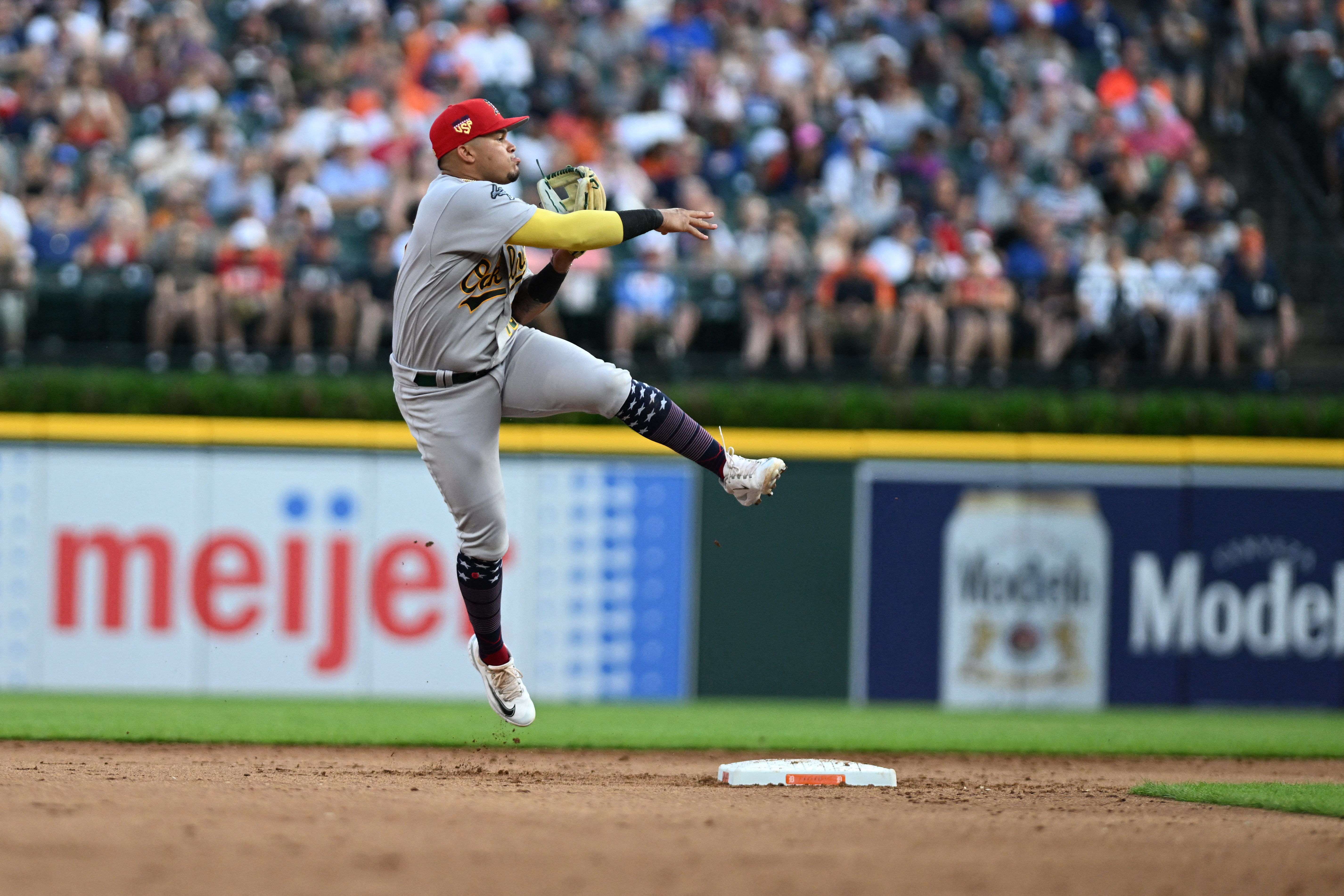 Báez's 2-run single in 1st starts Tigers to 9-0 rout of A's. 10th