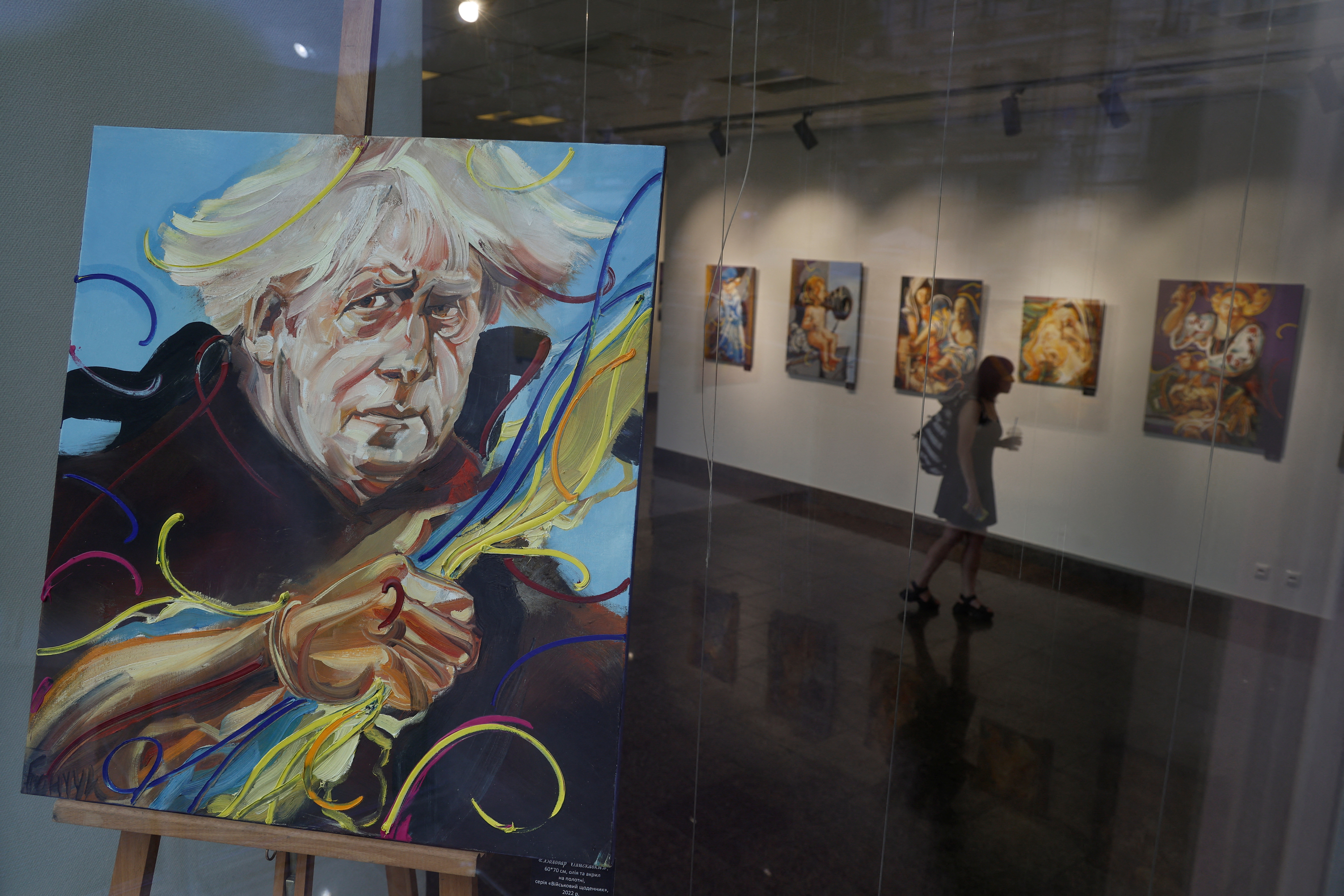 A portrait of British Prime Minister Boris Johnson is seen at a gallery in Kyiv